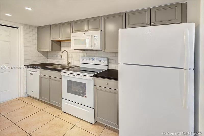 Beautiful 1 bed 1 and a half bath two-story condo-townhouse with entrance on the second floor, this unique unit offers 2 levels of living space accessed by a Spiral Metal Staircase, and a large rear patio for outdoor relaxation or entertainment. Spiral staircase invites you to the privacy of your master bedroom with an extra room that can be used for storage or closet. Low maintenance covers Landscaping, Parking, Pool Maintenance.