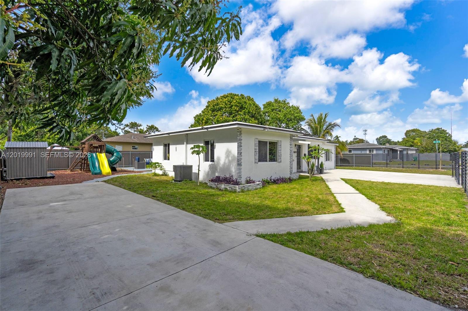 Welcome to this beautifully upgraded single-family home, offering 3 bedrooms, 2 modern bathrooms, and a sleek, updated kitchen. The home features a spacious living room, a cozy den perfect for family time or a home office, and sits on a large lot with plenty of yard space for outdoor activities. The home sits on a spacious lot with plenty of yard space. Enjoy the extended covered patio, ideal for entertaining, along with ample parking and a convenient laundry closet. Located near I-95, this property provides quick access to the Miami Design District and Wynwood Walls for world-class shopping, dining, and culture. Don’t miss this move-in-ready gem
