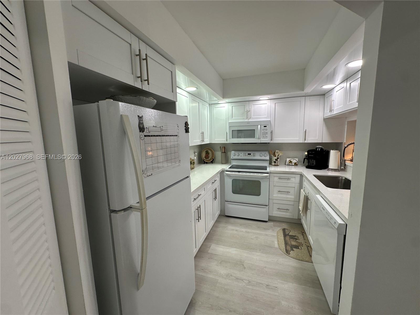 Looking for easy 55+ living in Pembroke Pines? This Gorgeous condo is completely remodeled top to bottom and features an updated kitchen, bathrooms, and floors; an in-unit washer and dryer; 1,045 square feet, and recessed lighting throughout. Sit on your patio overlooking the golf course and watch the sun set. Community offers transportation to nearby shopping, pharmacy, hospital/medical building, Clubhouse, Movie Theater, Billiard Rooms, Clinic, Convenience Store, Shuffleboard, Tennis, Gym, Multiple Pools, a host of arts and craft classes, clubs, and so much more in this amazing 55+ community. Transportation to surrounding medical and retail locations. No Pets