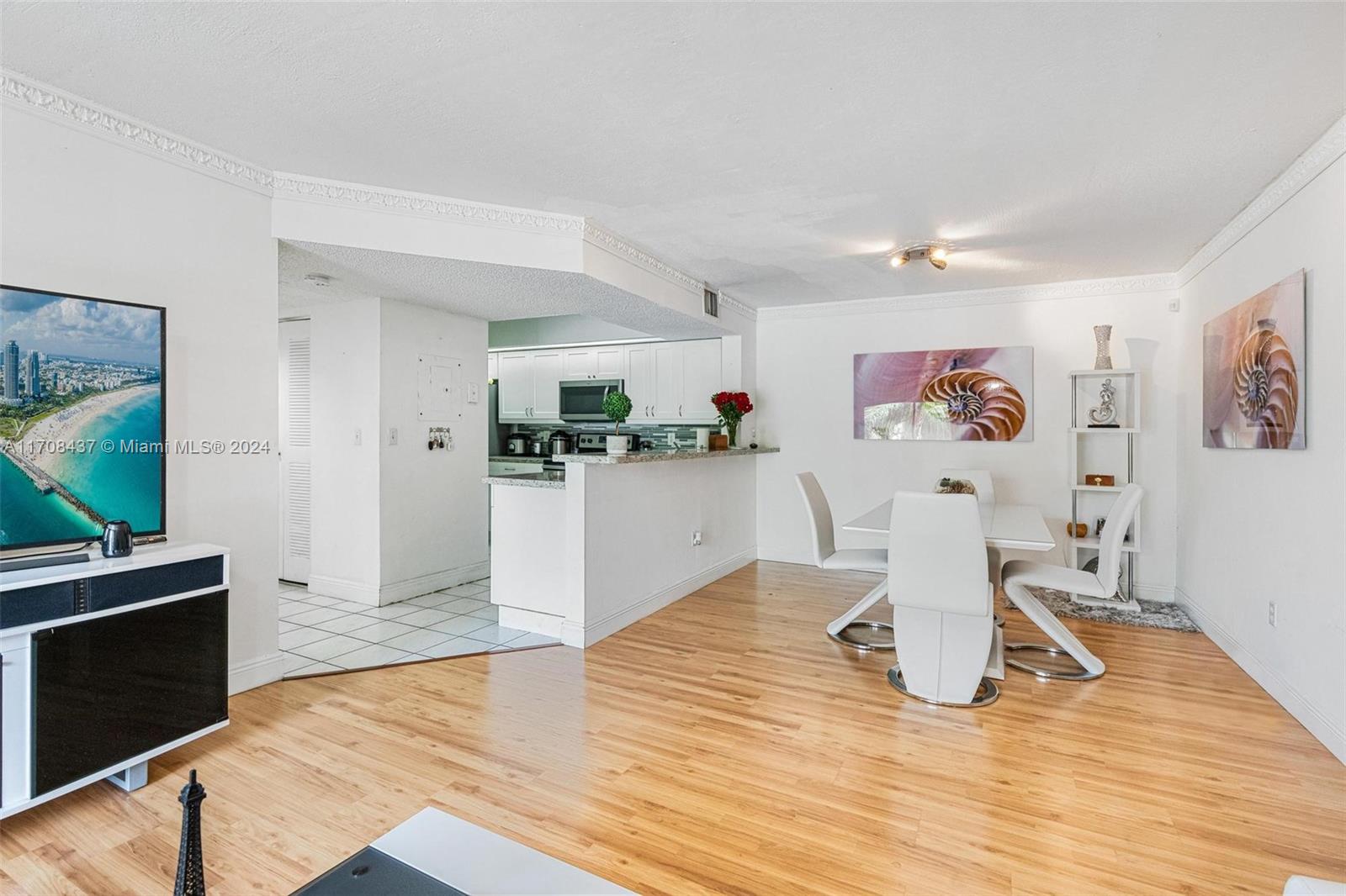 Beautiful 2nd floor corner condo unit in desirable Villa Rustica. Bright and open floor plan where living room opens to the balcony, second patio just off of the primary bedroom. Gorgeous kitchen with  granite countertops, stainless steel appliances. This unit comes with (1) parking spot plus PLENTY of guest spots, community pool, tennis courts and exercise room. Full-sized washer and dryer situated in the balcony, vinyl flooring in the living room/bedrooms and tile throughout kitchen/ bathrooms. EASY TO SHOW.