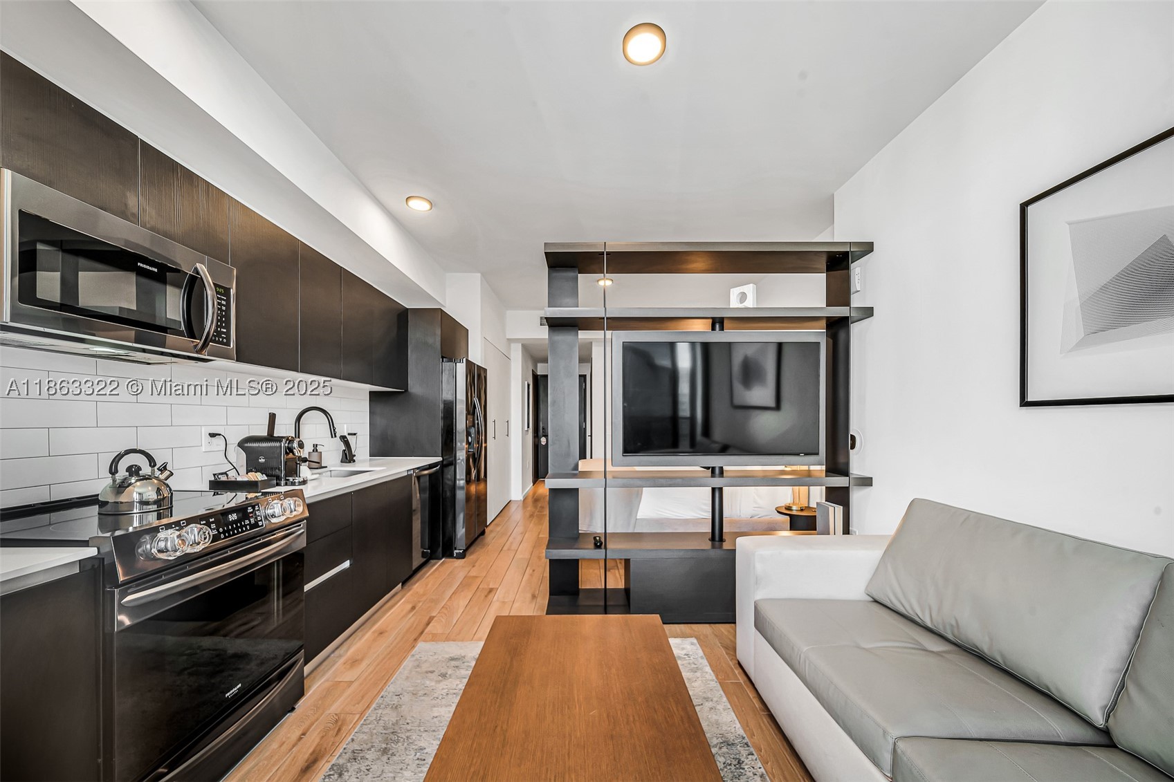 A rare blend where luxury meets investment potential for exceptional ROI in Downtown Miami. Experience modern elegance in this turnkey, fully furnished, high-floor designer studio with cinematic Biscayne Bay and Downtown skyline views. Floor-to-ceiling glass frames a sleek open layout with king bed, sofa bed, full kitchen, washer/dryer, curated finishes, and secure keyless entry. Command resort-caliber amenities: rooftop pool with bar and restaurant, two-story fitness center, jacuzzi, 24/7 concierge, Beach Club access, and valet. Steps to Kaseya Center, Bayside, Brightline, dining, and shopping. Flexible ownership allows for personal enjoyment or lucrative short-term rentals in a high-demand market. Seize this opportunity to own at The Elser.