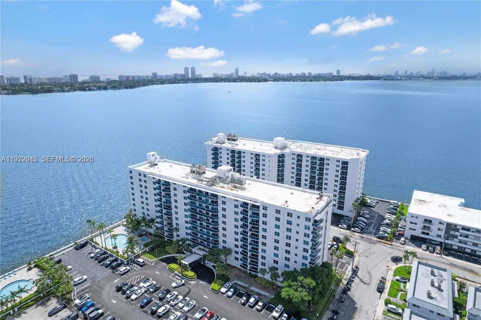 Beautiful renovated 2 bedroom condo in a fabulous location in booming North Bay Village. Hurricane windows, upgraded tile floors and gorgeous kitchen. Wonderful waterfront setting with cool breezes year round. Community has 3 pools, a terrific gym, and a convenience store right in the building. 
Brand new Publix being built up the street in walking distance. Only 2.5 miles to the ocean.
One block away from the free Miami Beach trolley that runs 7 days a week. 
Building is in the midst of completing exterior painting and concrete work and beginning to renovate all 3 elevators. Elevator assessment. Close to Downtown and world renowned Mt Sinai Medical Center.
Walking distance to new restaurants. Directly across the street from A rated Treasures Elementary. 
Easy to show... Agent lives in the building.