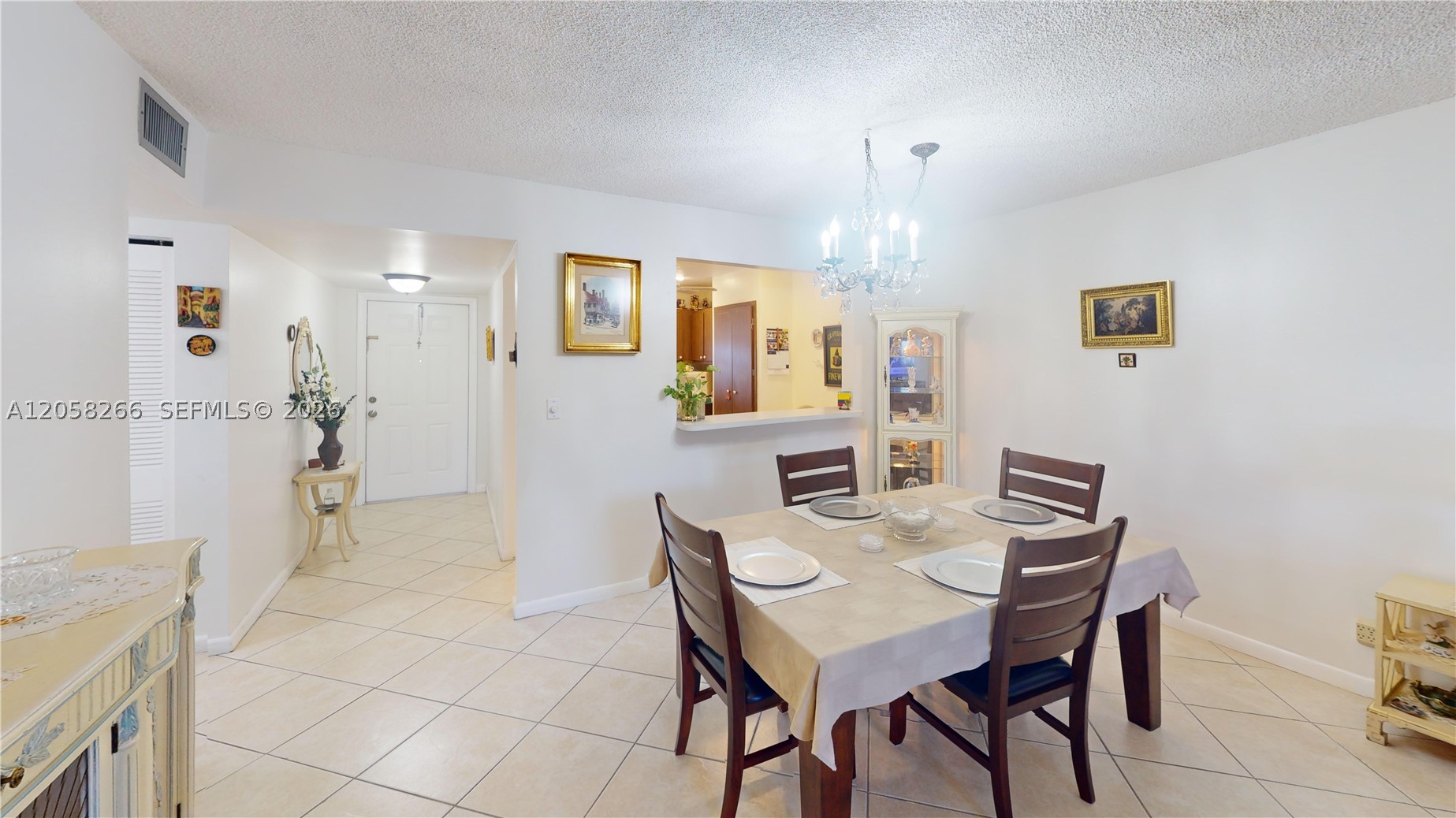 This property is worderfully located just across the street from the main clubhouse at Sunrise Lakes Phase 3, a block away from most of the activities in the neighborhood!  A full set of IMPACT WINDOWS protect the unit.  This large 2 bedroom condo comes furnished.  Just bring yourself, your clothes and your toothbrush to enjoy living here!  The view overlooks one of the putting greens without obstructions.  The unit has been meticulously cared for and the furniture is nearly new.  Check out the virtual tour to see all the details of this unit.  Both bathrooms have been updated!