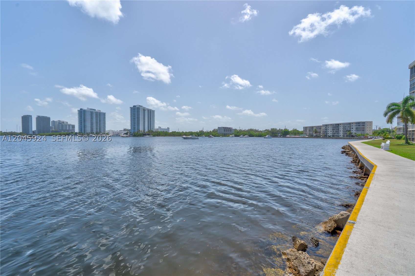 DON'T MISS THIS INCREDIBLE OPPORTUNITY TO OWN A ONE (1) BEDROOM, ONE (1) BATH WATERFRONT CONDO WITH BREATHTAKING, SERENE WIDE-WATER VIEWS FROM BOTH THE LIVING AREA AND YOUR PRIVATE BALCONY. NEWER MODERN BATHROOM WITH A WALK IN SHOWER! LOCATED IN A DESIRABLE 55+ GATED COMMUNITY WITH A 24-HOUR MANNED GUARD GATE. THIS RESIDENCE OFFERS THE PERFECT BLEND OF COMFORT, SECURITY AND AN ACTIVE LIFESTYLE.  RESIDENTS ENJOY AN IMPRESSIVE ARRAY OF AMENITIES, INCLUDING A HEATED POOL, LARGE BILLARD ROOM, CARD ROOM, MOVIE NIGHTS, DANCING, HOT LUNCHES DURING THE WEEK, COURTESY SHUTTLE BUS & COURTESY FREEBIE CAR SERVICE.  CONVENIENTLY LOCATED WITHIN WALKING DISTANCE TO PLUM MARKET, FINE RESTUARANTS & EVERYDAY CONVENIENCES.  IDEALLY SITUATED JUST MINUTES FROM AVENTURA MALL, BEAUTIFUL BEACHES, FIU, HARD ROCK STADIUM, I-95 & AN ABUNDANCE OF FINE DINING & ENTERTAINMENT.  EXPERIENCE THE BEST OF SOUTH FLORIDA RETIREMENT LIVING IN THIS VIBRANT AMENITY-RICH COMMUNITY.  SCHEDULE YOUR PRIVATE SHOWING TODAY!