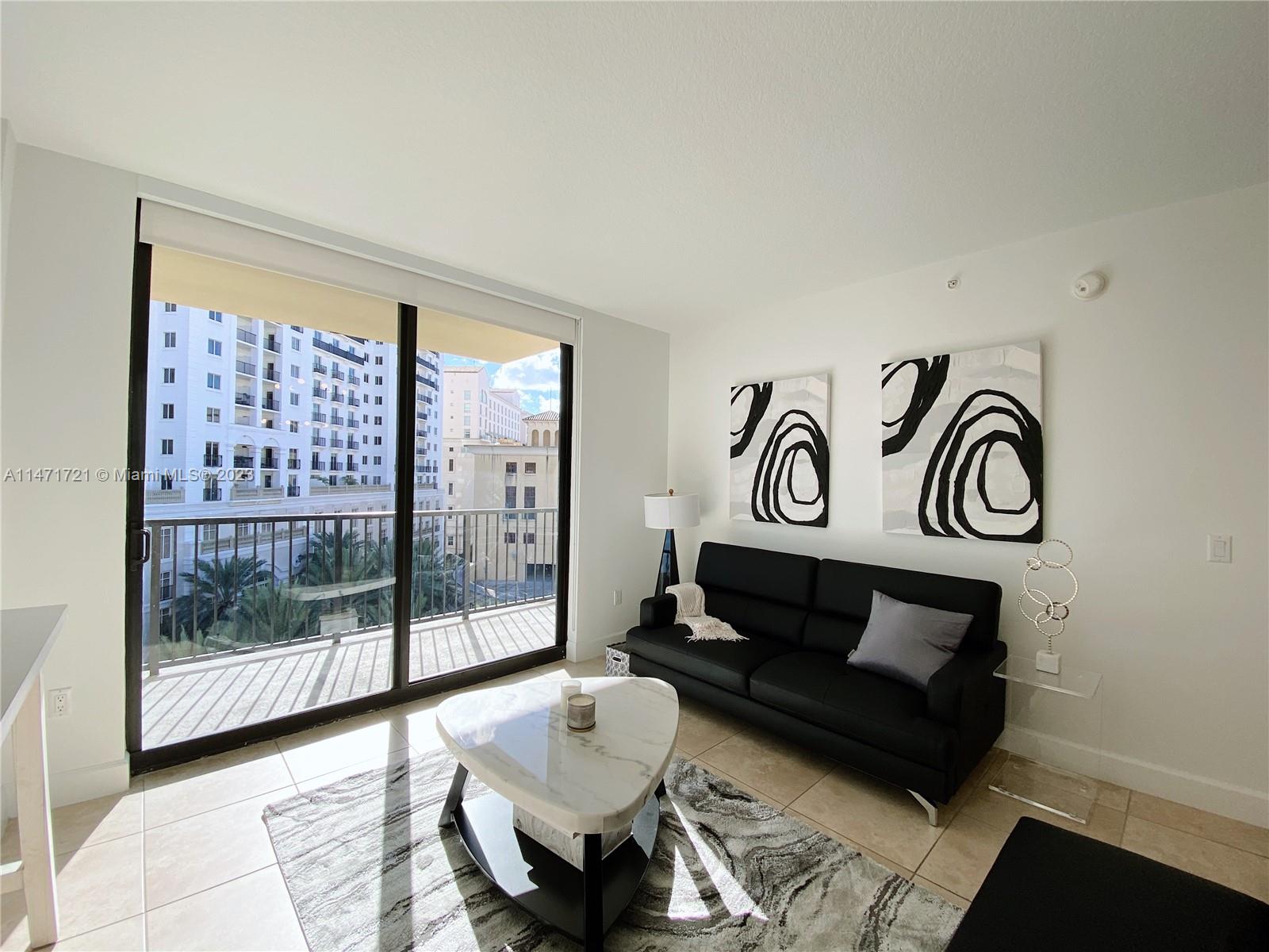 Available immediately through mid-May, FURNISHED - Brand new furnishings just arrived in this split floor plan, 2 bed, 2.5 bath in the heart of Coral Gables. 2 assigned parking spaces. Impact glass and balcony doors. Steps from Giralda Ave's dining, cafes, and bars. Happy hour at Motek on Miracle Mile has never been so close! Easy access to University of Miami, the Shops at Merrick Park, Granada Golf Course, Coconut Grove, and MIA International Airport. Full service building with 24/7 front desk, valet, pool, fitness center.