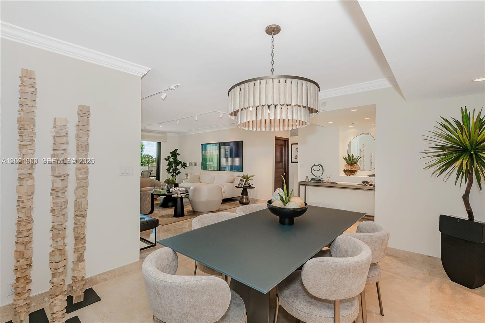 Enjoy oceanfront living at the Towers of Key Biscayne in this two-bedroom, two-bath E Tower unit with stunning bay views. Recently remodeled with impeccable attention to detail, this home offers full-service amenities like tennis courts, a restaurant, social spaces, and a salon. The split-plan Biscayo layout features generous closets and storage, with extra storage space on the same floor. An open kitchen, formal dining area, and spacious living room add to the appeal. High-end finishes include marble floors, built-out closets, upgraded appliances, a wine cooler, stackable washer and dryer, two assigned parking spots, and no special assessments. This turnkey unit is ready to impress.