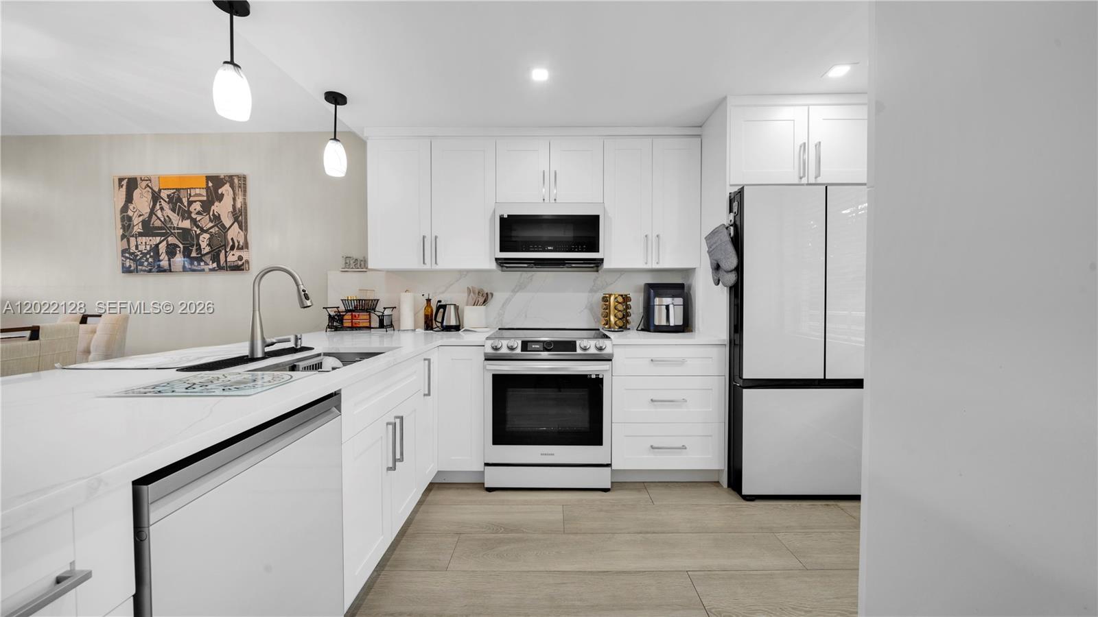The best-upgraded unit in Palm-Aire. This stunning 2BD/2BA 5th-floor condo features a chef's kitchen unlike any other in the complex — custom floor-to-ceiling cabinetry built exclusively for this unit, quartz waterfall island, marble backsplash, Samsung Bespoke refrigerator, dishwasher, and brand-new stainless Samsung appliances.
Floors are premium porcelain throughout — not vinyl plank — built to last a lifetime and look like it. In-unit LG stacked washer/dryer, designer built-in storage, and upscale finishes from entry to balcony.
Wake up to sweeping golf course views from both bedrooms and unwind on your oversized enclosed balcony with roll-down hurricane shutters
Palm-Aire is one of South Florida's most coveted hidden gems — 1,500 acres of lush, manicured grounds, quiet walkable streets, completely insulated from traffic, and safe enough to stroll at any hour with family. A true community feel that's increasingly rare.
Steps from Publix, minutes to dining, I-95, beaches, and FLL Airport. HOA includes water, trash & cable.
Schedule your showing — units like this don't last.