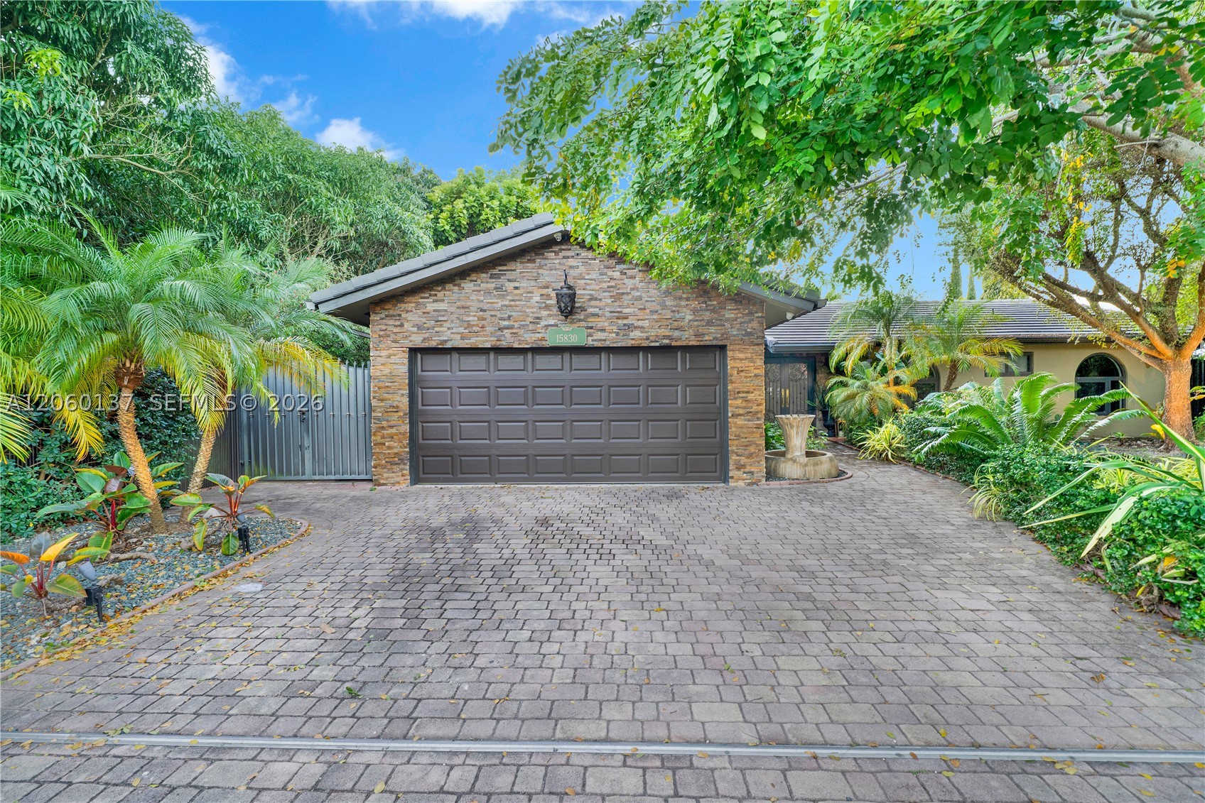 Welcome to this beautifully remodeled West Kendall gem, where luxury, quality, and thoughtful design come together. Situated in one of Kendall's most sought-after neighborhoods, this meticulously maintained home offers exceptional indoor and outdoor living with a private pool, gated entrance, and countless high-end upgrades throughout.

The home features a newer roof (less than 5 years old), a newer A/C (approximately 3 years old), impact windows and doors throughout, and a stunning designer kitchen with premium finishes and newer appliances. The spacious primary suite is a true retreat, showcasing a spa-inspired bathroom and an incredible custom boutique-style walk-in closet.

Currently configured as a spacious 2-bedroom, 2-bathroom home, it can easily be converted back to its original 3-bedroom layout. There's even additional upside with the potential to convert the oversized 2-car garage for added living space, if desired.

Every detail reflects pride of ownership, from the luxury renovations to the hardwired security camera system and numerous quality improvements that make this home truly move-in ready. If you're looking for a turnkey property with style, flexibility, and room to grow in prime West Kendall, this is the one. Schedule your private showing today!