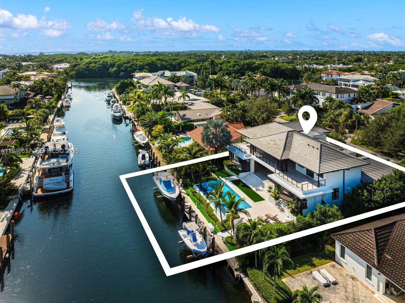 Introducing a 2023 newly constructed Tropical Modern masterpiece in the 24/7 guard-gated enclave of Sunrise Harbour, where the Grove meets the Gables. Enjoy resort-style living every day of the year in this elegant 6BD/7.5BA waterfront residence w/ sweeping terraces. Sun-filled interiors flow seamlessly into expansive outdoor spaces, embracing Miami’s indoor–outdoor lifestyle. Featuring an open floor plan, the living & dining areas are surrounded by dramatic walls of glass, while a chef’s kitchen anchors the home w/ chic finishes & modern functionality — ideal for both everyday living & effortless entertaining. The upstairs primary suite is a tranquil sanctuary w/ spa-like baths & serene water views from a private covered terrace. Additional guest suites offer privacy & comfort for family & visitors alike, all serviced by a private elevator. Staff quarters & double-height garage for 4 cars are complemented by a lower-level basement offering endless possibilities: an additional 4-car gallery (for a total of 8 parking spaces) + a state-of-the-art gym & wellness retreat. Seconds from effortless Open Bay & no bridges, enjoy 100 feet of SAFE HARBOUR waterfront w/ 2 boat lifts, deep-water w/ no tidal restrictions, ideal for yachting & water sports. A rare chance to own a newly completed waterfront residence in one of the most desirable & exclusive yachting communities, moments from top schools, exciting Michelin star restaurants & designer shops of Merrick Park, Cocowalk & beyond.