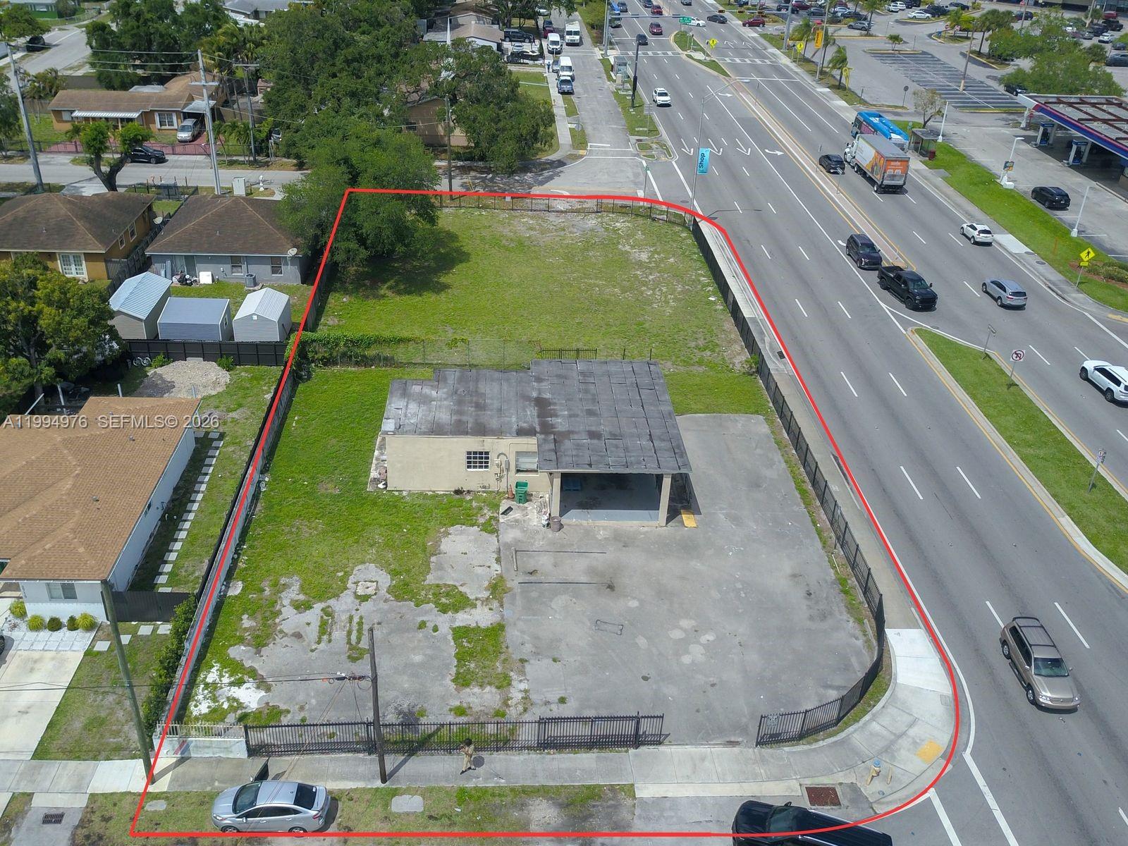 Located along a major thoroughfare just off the Palmetto Expressway (SR-826), this offering presents four contiguous parcels totaling 23,100 SF, offered together at $1,650,000. With block-to-block frontage on NW 27th Avenue, the property provides outstanding visibility and access along one of the area’s busiest corridors.

Zoned Neighborhood Commercial (NC), the site allows for a wide range of retail and service-oriented uses, making it ideal for investors, developers, or owner-users seeking a strategic location in a high-demand market.

Previously utilized as an automotive center, the property benefits from existing infrastructure, including an updated water well system and an electrical system that is ready for immediate use, helping streamline redevelopment or occupancy.

The 882-square-foot building on the property is well maintained and compliant, providing confidence and ease for a new owner.

Surrounded by strong traffic flow and dense population, the site is located just minutes from Hard Rock Stadium and offers convenient connectivity to I-95 and the Florida Turnpike, enhancing accessibility for both customers and operators.

This is a rare opportunity for an owner-user ready to move in or an investor looking to develop a high-exposure, flexible-use commercial site in a rapidly growing corridor.