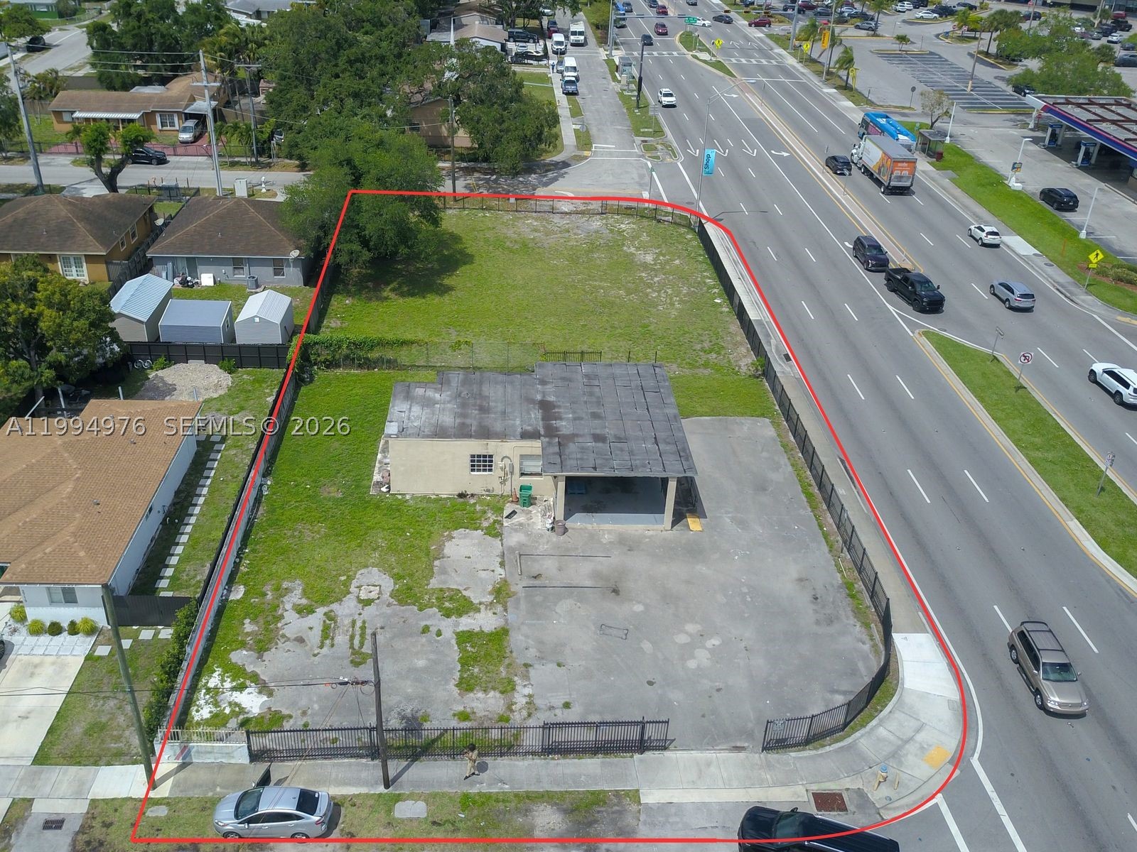 Located along a major thoroughfare just off the Palmetto Expressway (SR-826), this offering presents four contiguous parcels totaling 23,100 SF, offered together at $1,650,000. With block-to-block frontage on NW 27th Avenue, the property provides outstanding visibility and access along one of the area’s busiest corridors.

Zoned Neighborhood Commercial (NC), the site allows for a wide range of retail and service-oriented uses, making it ideal for investors, developers, or owner-users seeking a strategic location in a high-demand market.

Previously utilized as an automotive center, the property benefits from existing infrastructure, including an updated water well system and an electrical system that is ready for immediate use, helping streamline redevelopment or occupancy.

The 882-square-foot building on the property is well maintained and compliant, providing confidence and ease for a new owner.

Surrounded by strong traffic flow and dense population, the site is located just minutes from Hard Rock Stadium and offers convenient connectivity to I-95 and the Florida Turnpike, enhancing accessibility for both customers and operators.

This is a rare opportunity for an owner-user ready to move in or an investor looking to develop a high-exposure, flexible-use commercial site in a rapidly growing corridor.