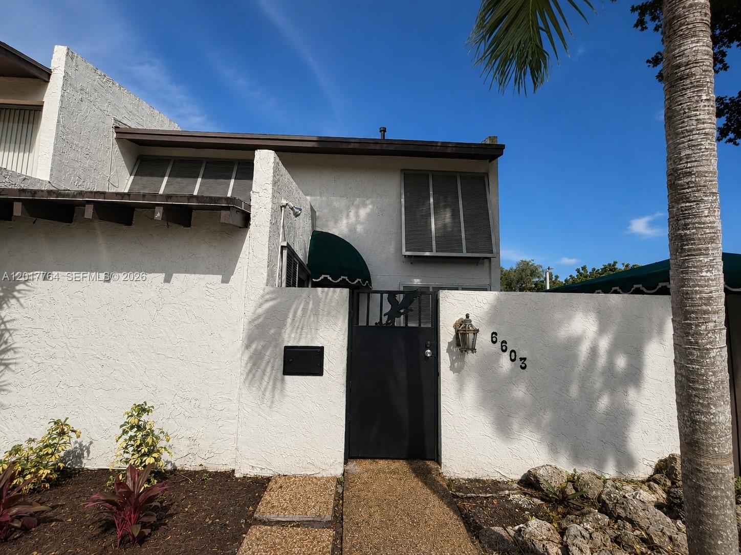 Beautifully renovated and move-in ready corner unit townhouse located in the highly desirable Kendall area, west of US-1. This spacious 3-bedroom, 2-bathroom home features an updated interior, functional layout, abundant natural light, and added privacy as a corner unit. Enjoy a private outdoor area perfect for relaxing or entertaining. Situated in a quiet and well-maintained community with low association fees that covers landscaping and paint . Community amenities include a pool, cabana clubhouse, tennis courts, and basketball court. Conveniently close to top-rated schools, shopping centers, restaurants, parks, and major highways. Excellent opportunity for both end-users and investors.