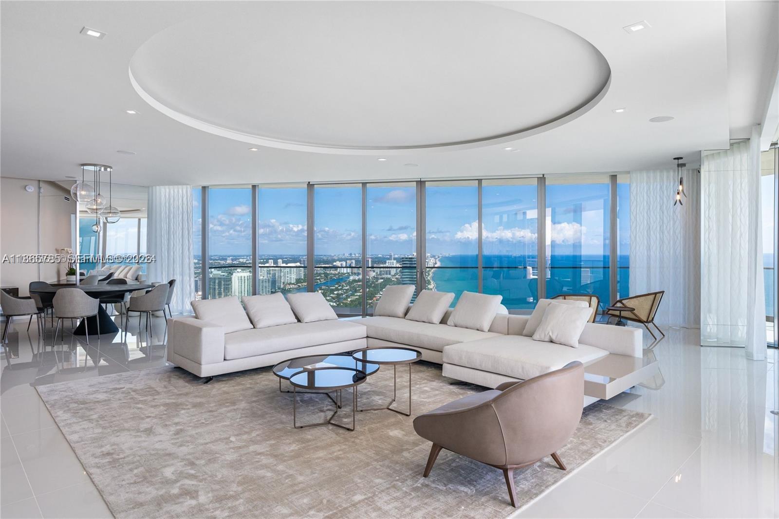 Highest Corner Wrap around Available in the Best Line "00" at Residences by Armani Casa. Residence #4600 is fully designer finished, features 4 bed/ 5 1/2 baths, oversized wrap around terrace, + nanny room. This layout is the best layout on the beach, Enjoy breathtaking views from South beach to Ft. Lauderdale ,Endless Ocean & Intracoastal from all areas. This Gem is fully Turnkey only "Toothbrush needed* It is spacious modern & elegant w/ 10 Ft ceilings & Expansive deep balconies boasting summer kitchen create a seamless expansion of living space into the fresh Ocean Air, Chic European kitchen. Smart home w/ digital techknowlogy. Master Suite includes midnight bar. Residents will enjoy beach service, full service spa, private restaurant, game room, cigar/wine room, & child's play room.