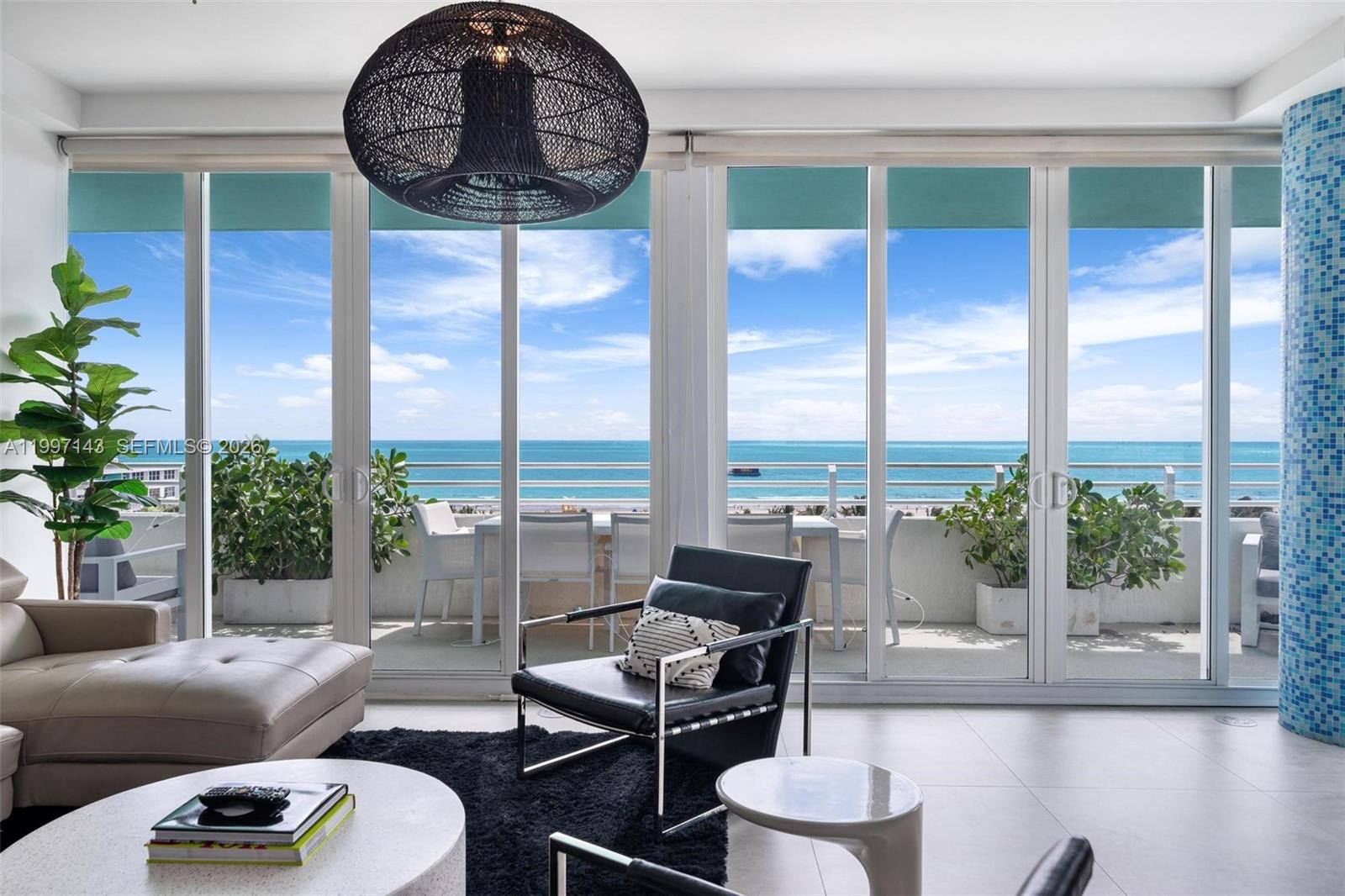 Positioned on the top floor of a boutique South of Fifth building, this southeast/southwest corner penthouse offers direct oceanfront exposure with unobstructed views of the Atlantic, South Pointe Park, and the Miami skyline — all from an expansive wraparound balcony spanning both exposures.
The open-concept living and dining area flows seamlessly to the balcony, capturing sweeping ocean and park views from every angle. The primary suite faces east with direct ocean sightlines and morning light, while the west-facing guest suite frames the park and city skyline at sunset — each bedroom with private balcony access.
The primary bath is appointed with dual vanities, a soaking tub, and a separate glass-enclosed shower. The guest suite features its own full en-suite bath. Both bedrooms offer generous closet space and direct terrace access.
Building amenities include a pool, assigned parking, and a flexible rental policy permitting up to 12 short-term rentals annually — one of the most permissive in Miami Beach's most coveted neighborhood. Steps to Joe's Stone Crab, Milo's, and South Pointe Park. Available for short-term lease through November 15th.