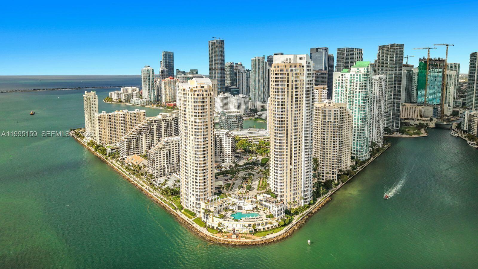 Breathtaking panoramic views from this 20th-floor - GEM overlooking Biscayne Bay with views from the ocean, Key Biscayne, Virginia Key, Fisher Island, Port of Miami and Miami Beach.  
1709 sq ft plus 163 sq ft of balcony - TOTAL 1872 SQ FT.   2 large beds, 2 & 1/2 baths.    NO SPECIAL ASSESSMENT AND VERY LOW MAINTENANCE.

39-story waterfront on BRICKELL KEY, exclusive island next to BRICKELL. Two floors of fitness center - GYM (racquetball, squash, basketball, aerobics) tennis court, pool and hot tub, BBQ's, party room for 99 people, valet, 24/7 concierge, security and professional staff.  

25-YEAR RECERTIFICATION ISSUED BY THE CITY OF MIAMI.  
 
BRICKELL KEY is in construction with the MANDARING HOTEL and new condo starting at $5M & 2 penthouses sold for $50M each.