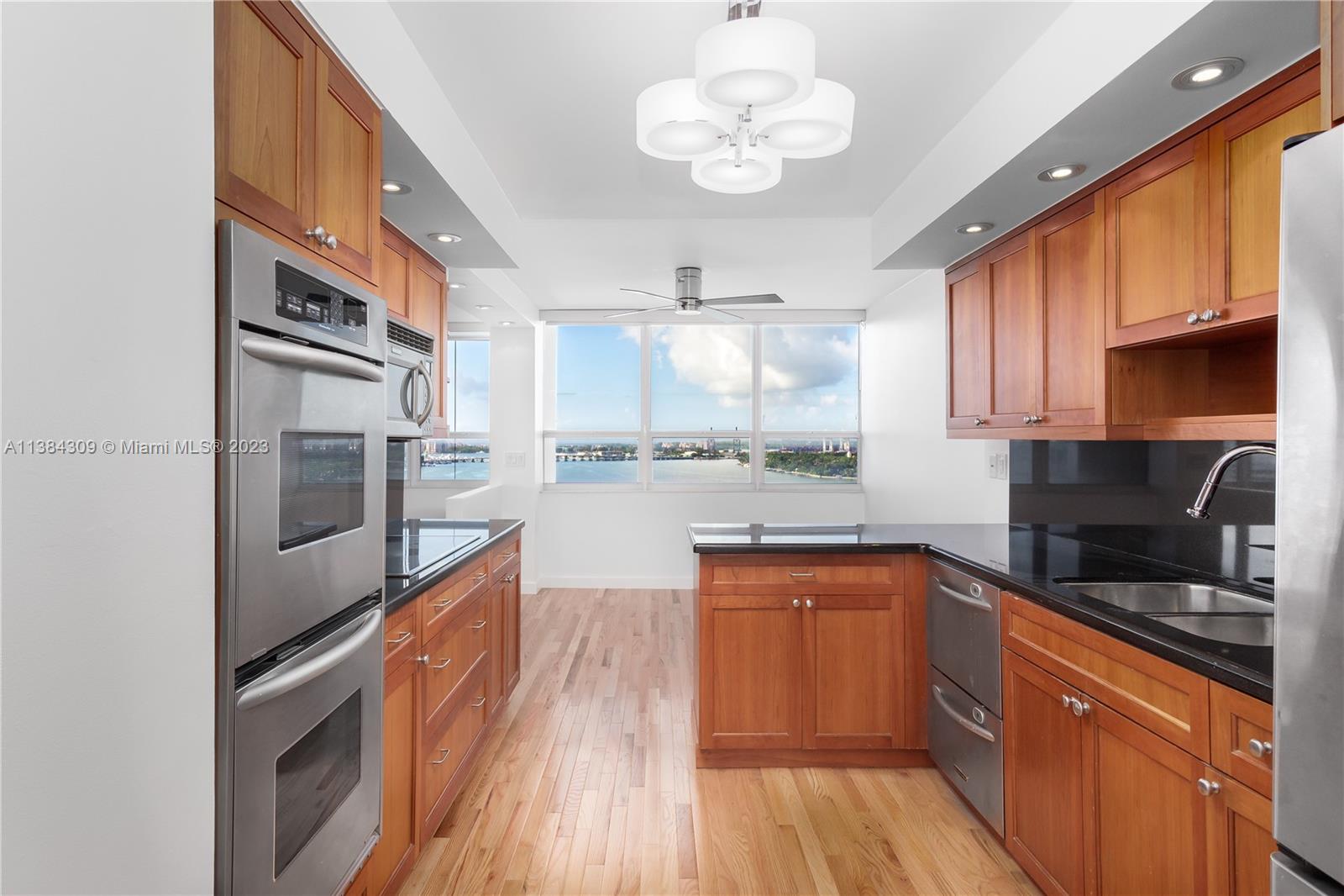 Enormous 2 bedroom corner unit with spectacular bay and Miami Beach views from every room. Beautiful oak wood floors throughout. Semi open kitchen and spacious living and dining room. Impact windows and sliding door. Watch the sunrise everyday from every window and enjoy the views from the oversized balcony. Minimum a one year lease, no exceptions! Easy to show.