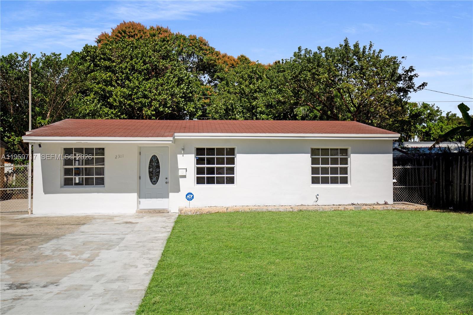 INVESTORS ONLY Located in Hollywood, this attractive single-family property offers a versatile opportunity with a 3-bedroom, 1-bath main residence plus a detached 1-bedroom, 1-bath mother-in-law suite. The main home features a bright and open-concept layout filled with natural light, creating a welcoming atmosphere for everyday living. The kitchen offers ample cabinetry and counter space. Comfortable bedrooms and a functional floor plan make this home appealing to both owners and long-term tenants. The detached mother-in-law suite includes its own private entrance, providing excellent flexibility for extended family, guests, or an additional rental stream. Situated in a desirable South Florida neighborhood surrounded by mature palm trees and tropical landscaping, this property delivers charm, versatility, and strong income potential. Conveniently located near shopping, dining, major roadways, and local amenities. A great opportunity for investors or owner-occupants looking to offset their mortgage with rental income.