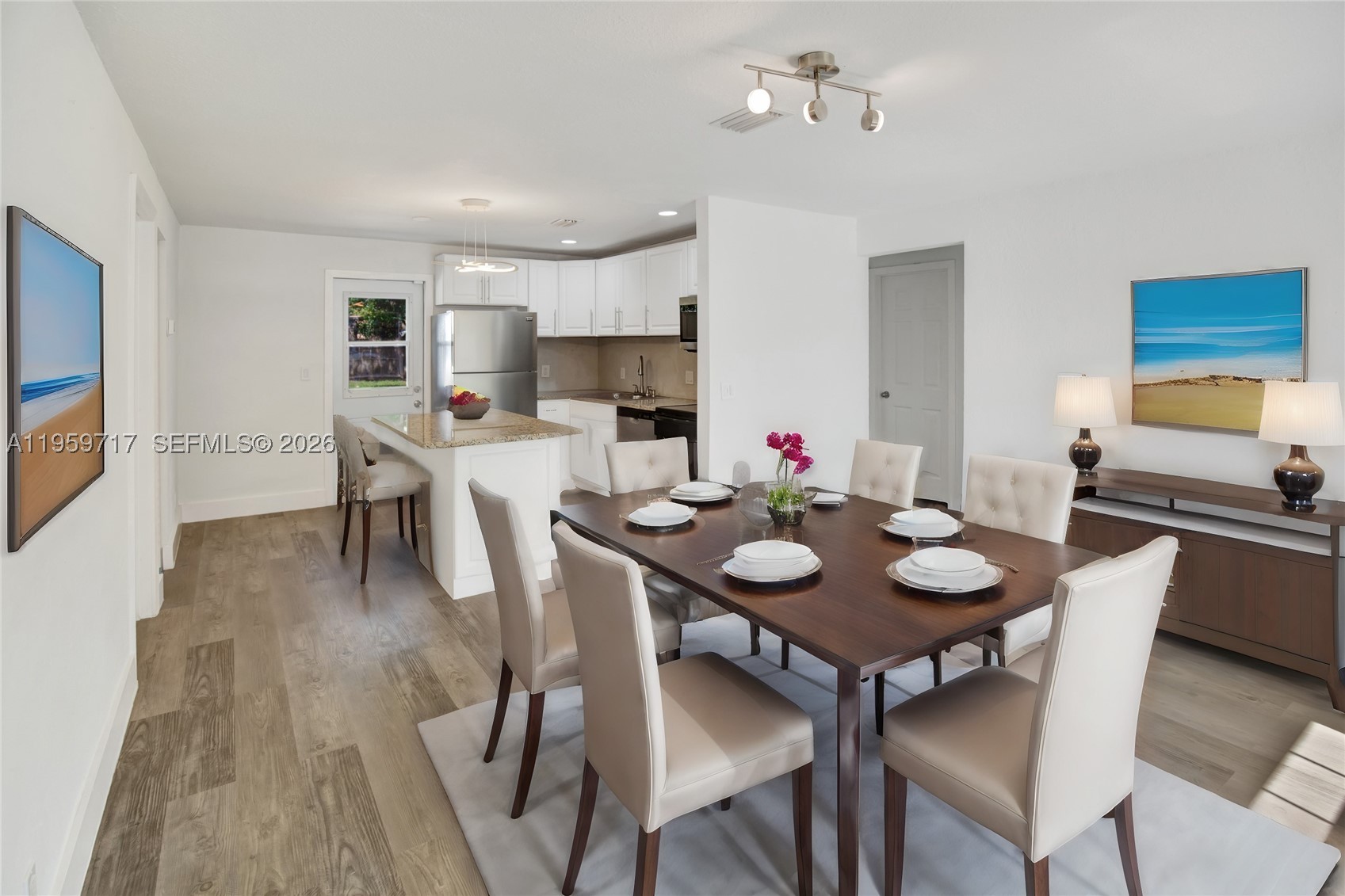 INVESTORS ONLY Located in Hollywood, this attractive single-family property offers a versatile opportunity with a 3-bedroom, 1-bath main residence plus a detached 1-bedroom, 1-bath mother-in-law suite. The main home features a bright and open-concept layout filled with natural light, creating a welcoming atmosphere for everyday living. The kitchen offers ample cabinetry and counter space. Comfortable bedrooms and a functional floor plan make this home appealing to both owners and long-term tenants. The detached mother-in-law suite includes its own private entrance, providing excellent flexibility for extended family, guests, or an additional rental stream. Situated in a desirable South Florida neighborhood surrounded by mature palm trees and tropical landscaping, this property delivers charm, versatility, and strong income potential. Conveniently located near shopping, dining, major roadways, and local amenities. A great opportunity for investors or owner-occupants looking to offset their mortgage with rental income.