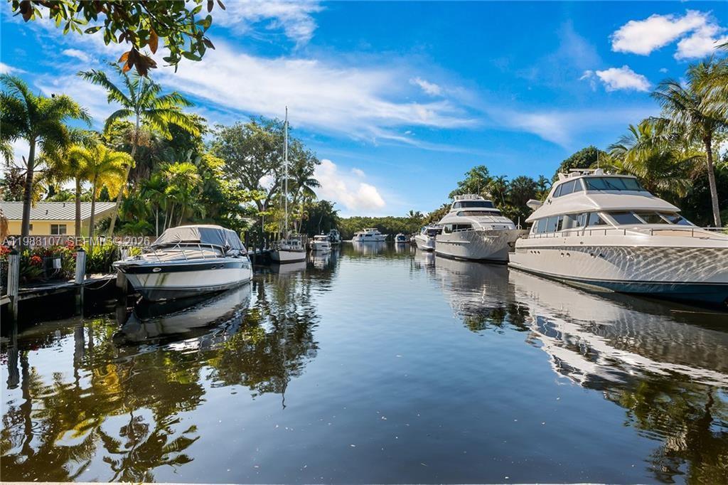 Discover waterfront paradise in this FULLY REMODELED home, set on a spacious 1/2-acre lot with 50 feet of water frontage. Ideally located at the end of a canal, it offers serene views of Secret Woods Nature Preserve. The outdoor entertainment area has been completely done, featuring an upgraded in-ground pool and beautifully landscaped grounds. Inside, the home boasts a contemporary open floor plan with new tile flooring throughout, wall panels and specious walk in closet in the primary room. The kitchen and bathrooms have been elegantly remodeled, showcasing modern finishes and fixtures. The primary suite is thoughtfully separated from the 4 additional bedrooms.A new roof was installed in 2021, ensuring peace of mind for years to come.this property is located less than 10 minutes from downtown Fort Lauderdale, FLL Airport, the beach, and more. 
SELLER PROMTION = SELLER TO OFFER 2 BATHROOMS OR KITCHEN UPDATE IF BUYER DESIRES FOR PERSONAL TASTE / SELLER TO REMOVE POPCORN CEILING PRIOR TO CLOSING! SELLER MOTIVATED!!!
