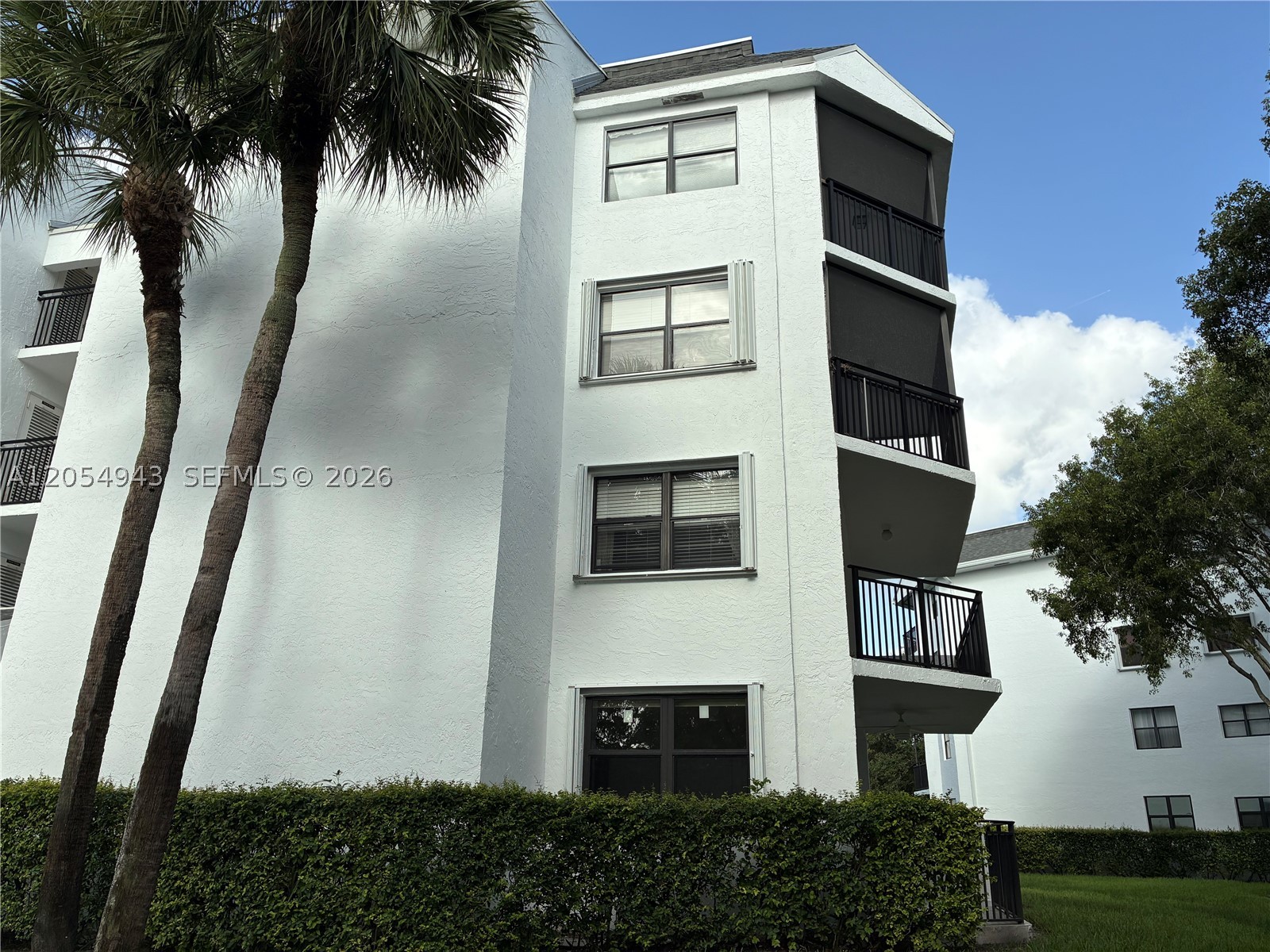 Rare opportunity to own a remodeled corner residence in Fairways At Bonaventure. One of Weston's most desirable community. Perfectly positioned with golf view. Community pools and tennis courts. Open floor plan, 1707 SFT living area. Private patio with stunning views. This 3 bedroom, 2 full bathrooms offers privacy and convenience. Master bedroom has its own patio. Inside you will find brand new impact windows and doors throughout, contemporary kitchen, white quartz countertop,  remodeled bathrooms, extra large living and dining area, foyer and patio, beautiful water proof laminate in the entire unit, laundry inside. Assigned parking and a lot of guest parking available! 24 hour video surveillance. Water include. Residence can also enjoy the amenities of Bonaventure Country Club, mandatory membership fee $475 per year!