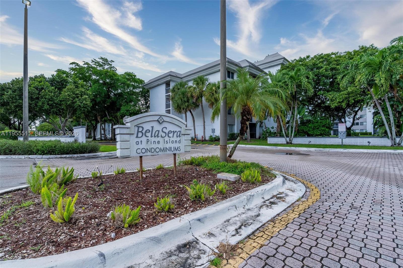 Spacious and well-maintained 1 bed, 1.5 bath condo in the desirable Belasera at Pine Island community. Located on the top (4th) floor, this unit offers privacy, a screened balcony with garden views,. Features include tile flooring throughout, a bright dining/living area, and a well-equipped kitchen. Enjoy resort-style amenities such as a community pool, clubhouse, gym, and laundry facilities. Assigned parking included. Conveniently located near shops, dining, highways, and top-rated schools. Available for annual lease. Association approval required. Easy to show. Schedule your private tour today and make this beautiful unit your new home! great area and excellent neighbors