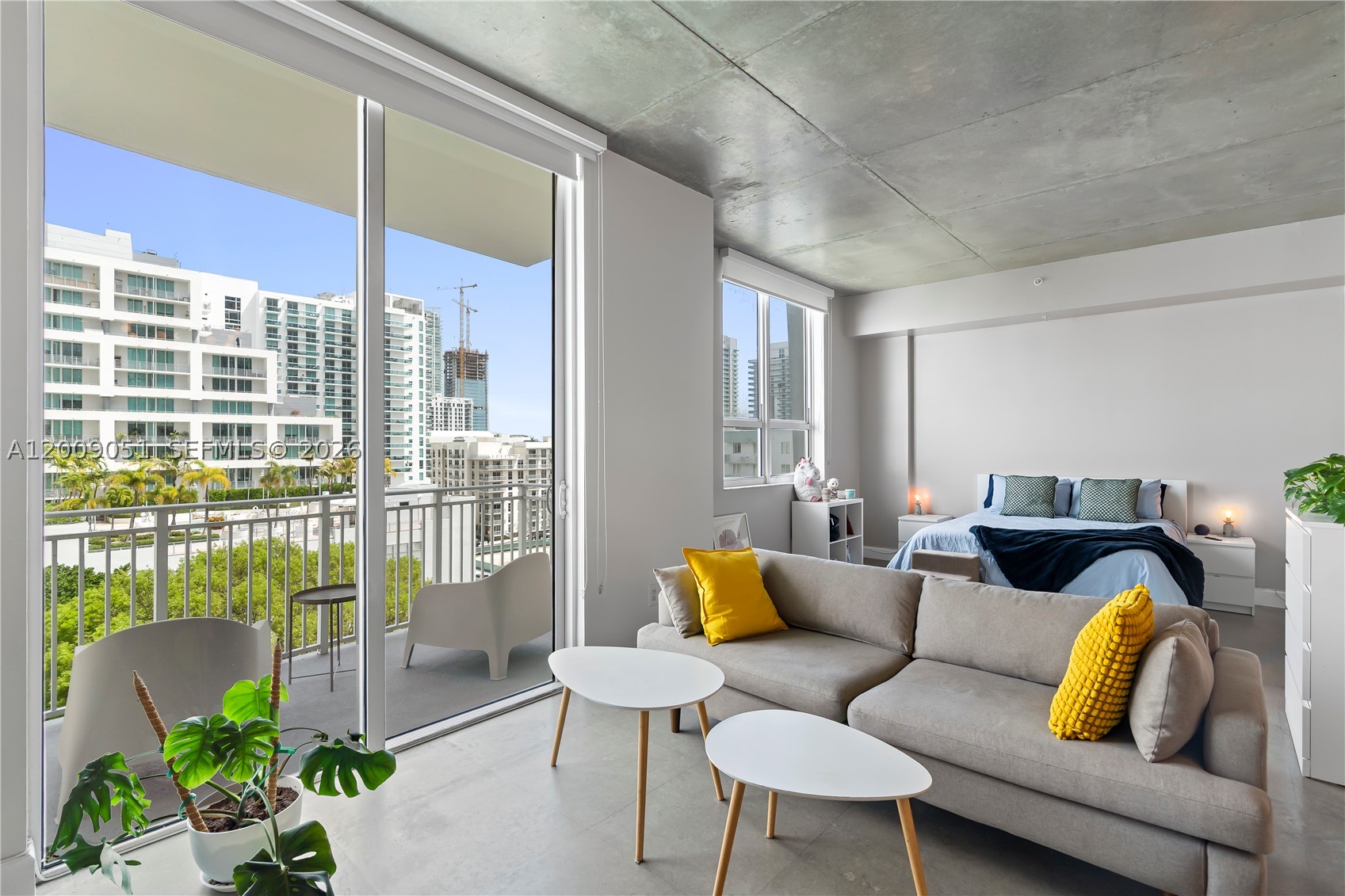 Stunning loft-style residence for sale at the highly sought-after Uptown Lofts, with 2 parking spaces! This beautiful 1-bedroom, 1-bath unit features polished concrete floors, soaring exposed concrete ceilings, and an open-concept layout that delivers a true modern SOHO-inspired feel. Enjoy impressive west, north, and east-facing views, plus an unbeatable location just a 2-minute walk from the bay, top coffee shops, and some of the area’s best dining experiences. 
Uptown Lofts offers excellent amenities, including a fully equipped fitness center, sauna, and a 5th-floor pool deck with a wet bar. The building is extremely well managed and maintains strong resident-selection standards, creating a comfortable and desirable living environment.
Perfectly located near both causeways to and from Miami Beach, this residence is only 4 minutes from Publix, 10 minutes from the Design District and Midtown Miami, and approximately 15 minutes from Miami International Airport. A rare opportunity to own a stylish urban loft in one of Miami’s most convenient locations. HOA is very competitive at less than $1.5 per sqft ($1,145). Come see it today!