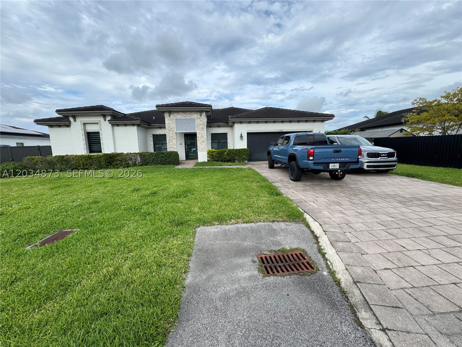 Stunning Single-Family Gem on an Oversized Lot in the Highly Coveted Bonita Grand Estates!
Welcome home to this beautifully designed, light-filled residence nestled in the heart of Bonita Grand Estates—a premier, quiet enclave in South Miami-Dade. Balancing suburban tranquility with modern convenience, this pristine property features 1,959 square feet of thoughtfully designed livable area crafted for both casual daily living and effortless entertaining. Step inside to an open-concept floor plan where soaring ceilings and large windows flood the space with natural South Florida sunlight. The heart of the home is a modern kitchen that flows seamlessly into an expansive family room, creating the ultimate gathering hub. The home boasts 3 generously sized bedrooms, including a serene primary retreat, complemented by 2 elegant full bathrooms and a conveniently located half bath perfect for guests. The true crown jewel of this property is its spectacular, oversized yard. Sitting on nearly a third of an acre (13,022 sq ft), the sprawling outdoor space offers endless possibilities: design your dream resort-style pool, an outdoor summer kitchen, or a tropical garden oasis.