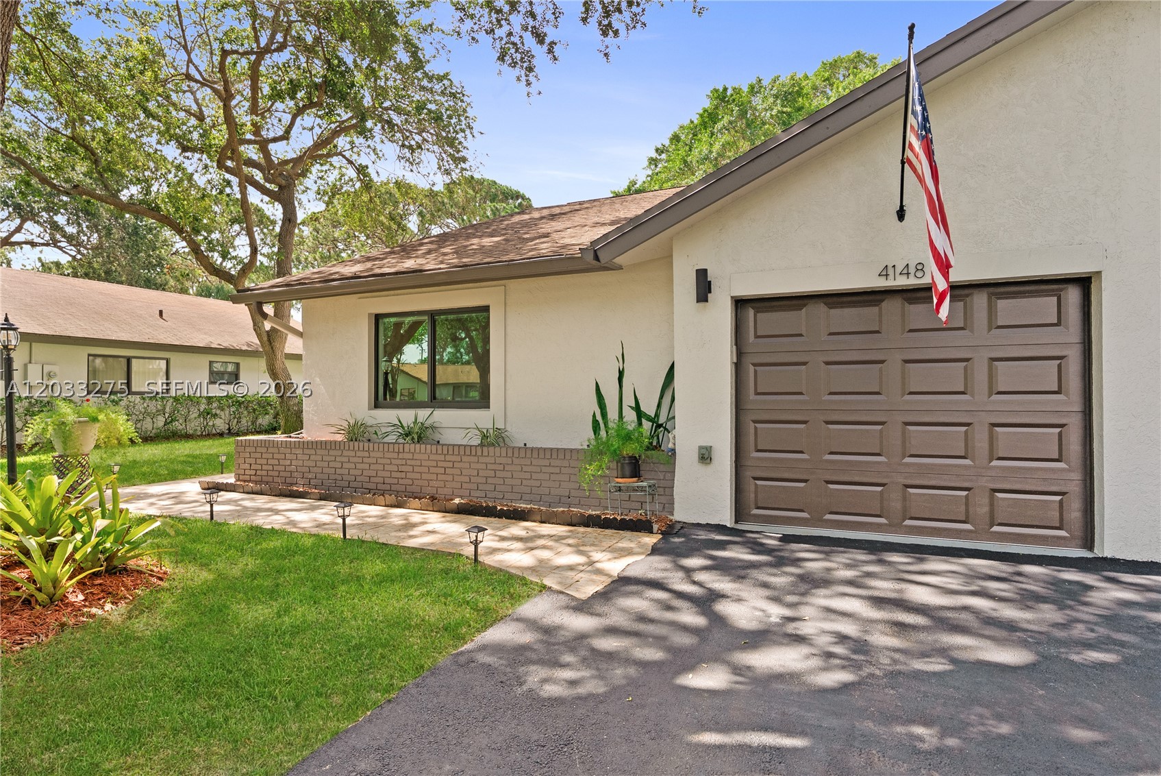 Dreams are for real. 
Welcome to Shadywoods, a hidden gem in Delray Beach known for lush landscaping, mature tree-lined streets, and a peaceful setting. This pet-friendly community offers low-maintenance living with HOA-maintained grounds and a low monthly HOA of $278. 

Pride of ownership shows throughout, with major updates including a 2021 roof, CAT 4-rated impact windows and doors, Leaf Gutter system with transferable lifetime warranty, Carrier two-stage A/C. Attached garage with new garage door, and a Wi-Fi-enabled garage door opener with built-in camera. 

Enjoy an extended screened patio with tranquil, picture-perfect views, plus French doors from the primary bedroom. Residents enjoy an exceptional lifestyle with access to a screened community pool overlooking a scenic golf course, tennis Court/Pickleball and a Basketball hoop and a clubhouse with library and gathering space. 

Ideally located minutes to the beach and Atlantic Ave dining, shopping, and entertainment, plus easy access to major roads and everyday conveniences. 

Current property taxes reflect financing associated with home improvement upgrades. The outstanding balance will be paid in full by the seller on or before closing and will not transfer to the buyer.