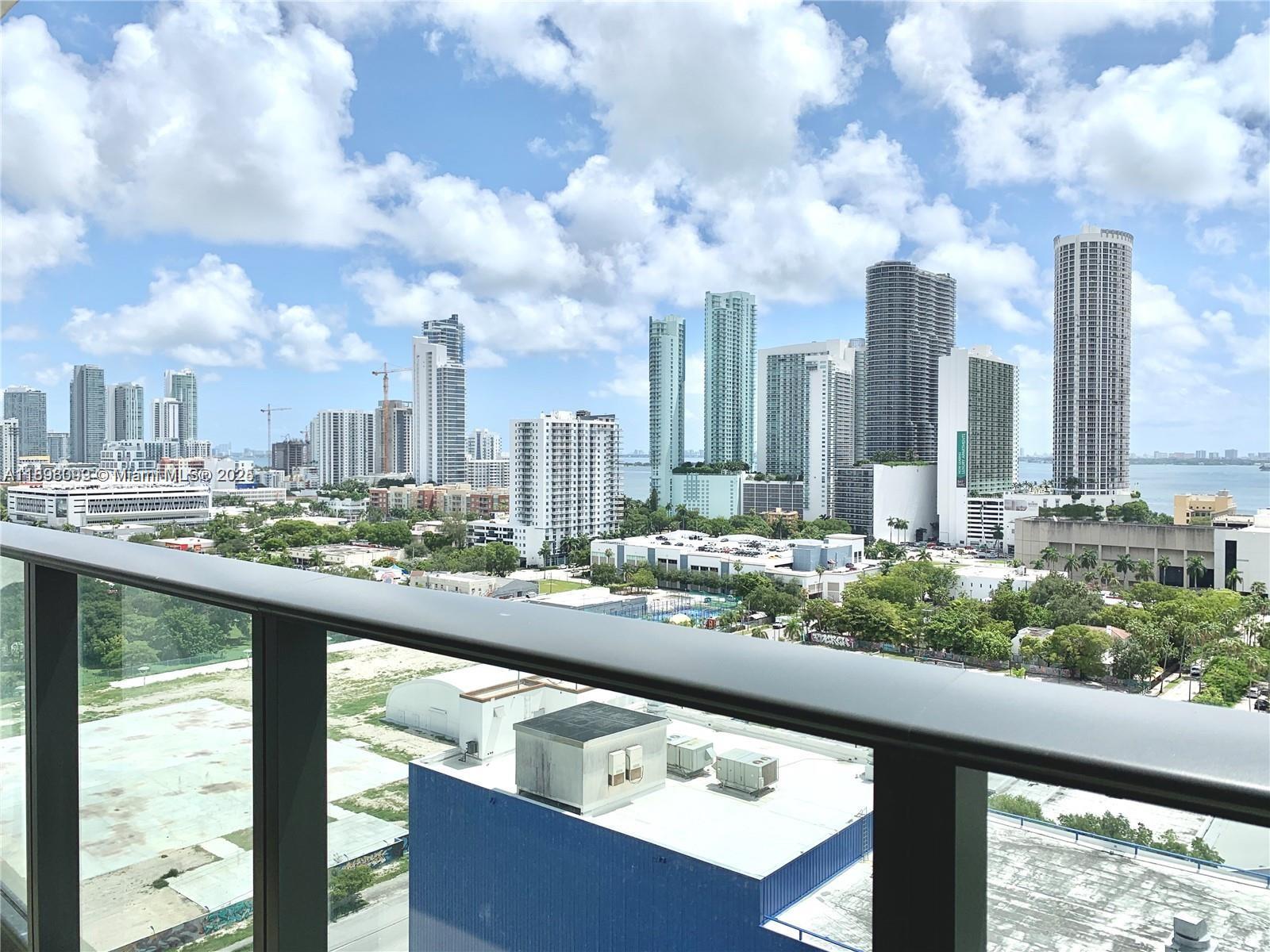 Modern & Bright Studio in Luxury Canvas Condo! This spacious unit features floor-to-ceiling panoramic windows with stunning Bay views, high-impact sliding doors, tiled floors throughout, and soaring 9-ft ceilings. The sleek, open kitchen is equipped with top-of-the-line stainless steel appliances. Enjoy 30,000+ sqft of resort-style amenities, including sunrise & sunset pools, jacuzzi, eco-friendly gardens, a state-of-the-art 3,000 sqft fitness center, yoga & massage rooms, theater, racquetball court, spa, sauna, and children's playroom. 24/7 security & concierge ensure a worry-free lifestyle. Prime location near the Miami Opera, Miami Arena, top restaurants, cafés, and galleries. Rent includes water, Wi-Fi, and basic cable. Live in the heart of Miami