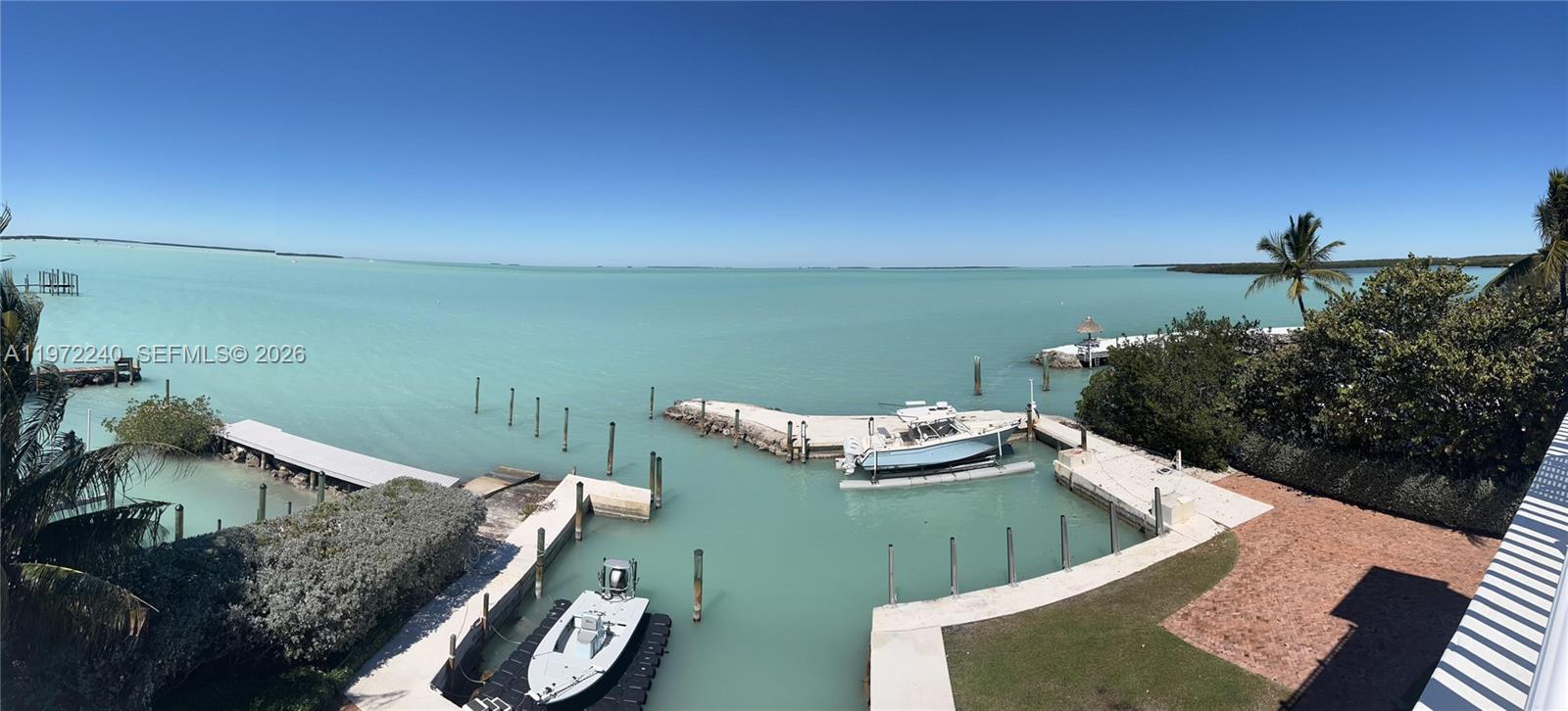 BAYSIDE, DEEP WATER, BREATHTAKING GULF VIEWS
Welcome to one of Islamorada's premier rare bayside estate properties - a remarkable parcel that stretches from Overseas Highway all the way to the Bay. The home bestows privacy, unobstructed Gulf Views, and a deep-water basin for calm dockage cable of accommodating substantial vessels with immediate access to world class sportfishing waters.

The residence includes 6 bedrooms, 7.5 bathrooms and was designed to blend coastal elegance with effortless waterfront living. In addition to the bedrooms, the main home provides a complete gym and office. A separate guest house includes a living room, full kitchen, laundry room, and two bedrooms with ensuite bathrooms. Located in the heart of Islamorada, the home is walkable to several restaurants.