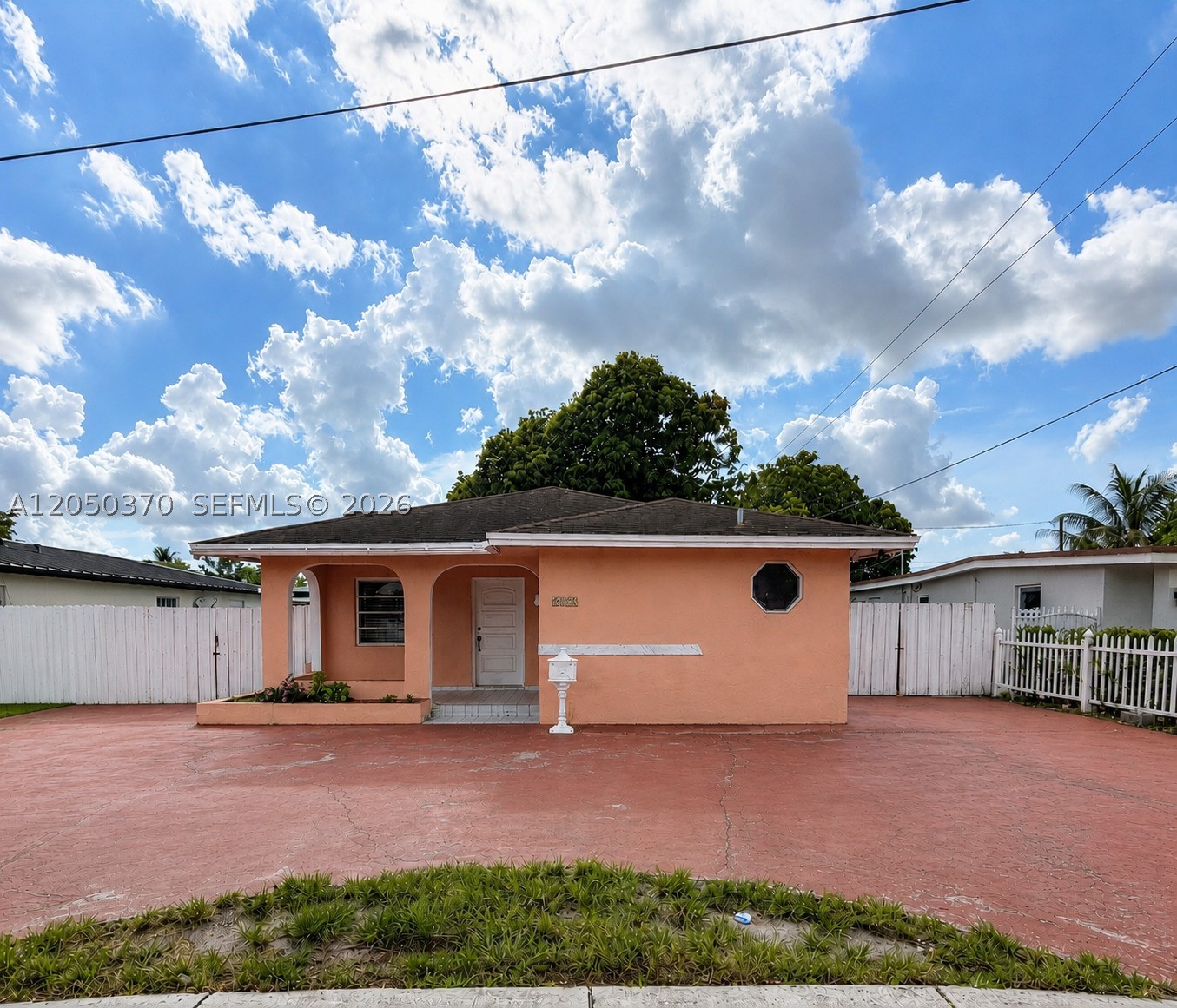 Discover the exceptional potential of this beautifully maintained home in the heart of Hialeah. Originally designed as a 3-bedroom, 3-bathroom residence, this property offers an expansive and versatile floor plan with outstanding flexibility for extended family living or future income-producing possibilities. A unique highlight is the original wet bar with its own private entrance, ready for the next owner to reimagine and maximize its potential. Recent improvements include fresh interior and exterior paint, a new water heater, and a well-maintained roof, providing added peace of mind. The property also features a legal detached storage unit, abundant parking for multiple vehicles, and a mature mango tree that produces an impressive harvest each season. With no HOA or association restrictions, you'll enjoy the freedom that's becoming increasingly rare in today's market. Ideally located near schools, shopping, dining, parks, and major highways, this home combines space, functionality, and long-term value in one of Miami-Dade's most consistently desirable communities. Contact the listing agent today to schedule your private showing and discover everything this property has to offer.