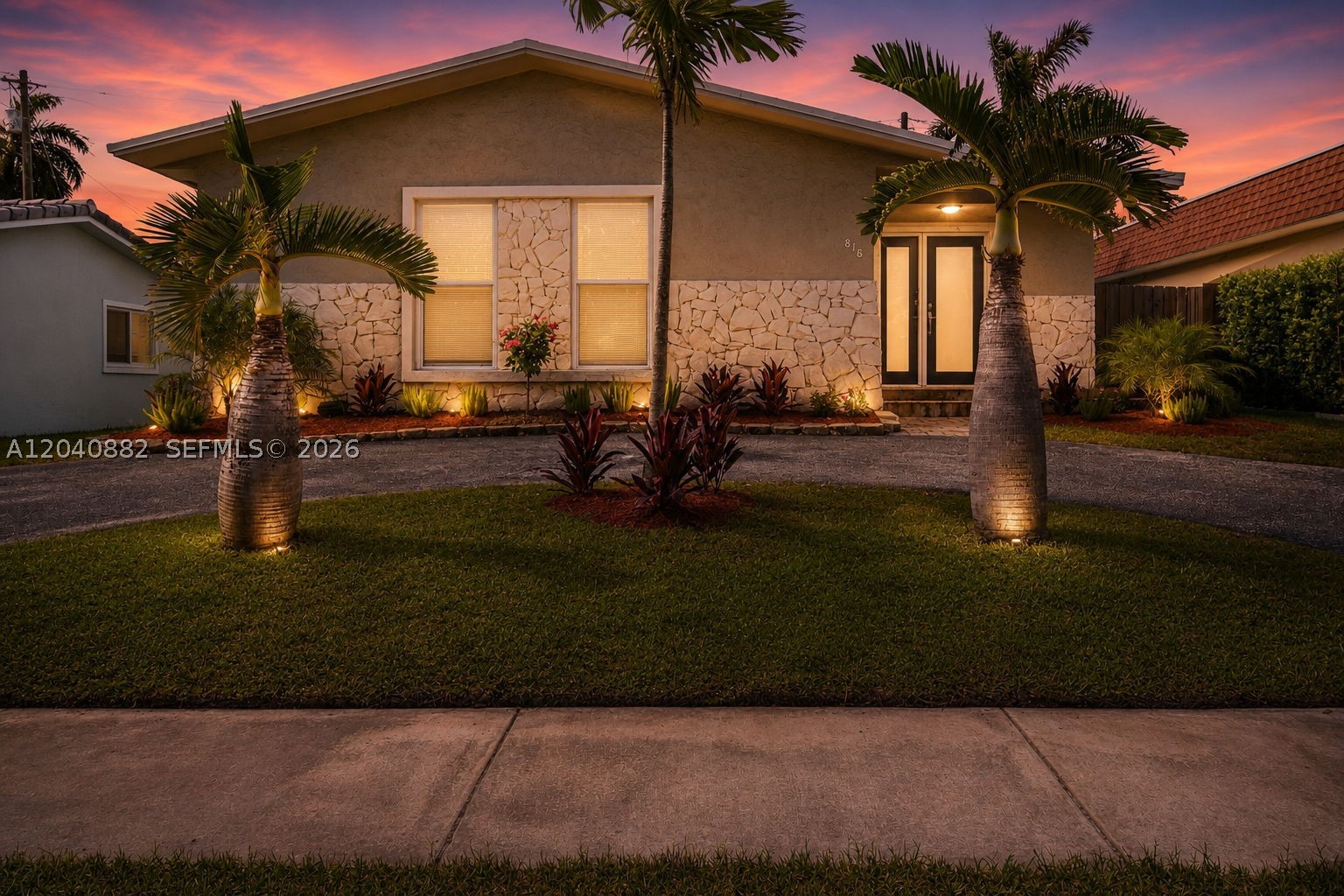 Rarely does a home come along that offers this combination of location, security, and style. Set in the heart of coveted Hollywood Lakes, this impeccably maintained 3-bedroom, 2-bathroom residence is built for the way South Floridians truly live. Full impact windows and doors provide both hurricane protection and whisper-quiet interiors. Inside, an open and flowing floor plan leads to a designer kitchen with stainless steel appliances and a grand island perfect for hosting. Outside, a spacious deck and patio extend your living space under the Florida sky. All of this just moments from Hollywood Beach, premier dining, A-rated charter schools, and major commuter routes. Location, lifestyle, and peace of mind — all in one address.