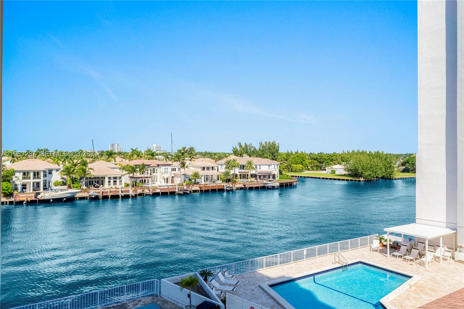 Remarkable location across a street from the ocean. This is just part of what makes this property so exceptional. Paces away from swimming, jogging, biking, fishing, and boating on white sand beach during the day, and minutes away from the best Boardwalk in the USA, fine dining, world-famous Margaritaville Resort, Gulfstream Village and Casino in the evening. Indulge in exquisite living in this light and bright, corner unit in quiet waterfront building located across the street from the ocean designed to spoil you with comfort and offer the best of S. Florida living. No-rent-1st year restriction guarantees safe and quiet residential paradise.