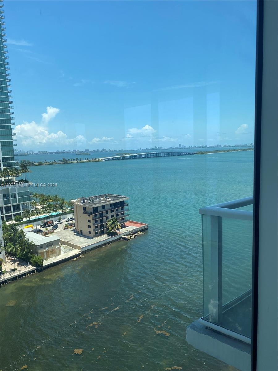 Elevated above the bay in the heart of Edgewater, this residence at The Crimson delivers a rare blend of light, views, and refined urban living. Floor-to-ceiling glass frames sweeping Biscayne Bay vistas, filling the interiors with natural light and creating a seamless connection between indoor comfort and Miami’s waterfront energy.

The thoughtfully designed layout offers an open living and dining experience ideal for both everyday living and entertaining, complemented by a private balcony perfectly positioned for sunrise views over the water. The primary suite provides a tranquil retreat with generous proportions and ample storage.

Located just minutes from Design District, Wynwood, and Downtown Miami, Edgewater continues to emerge as one of the city’s most dynamic waterfront neighborhoods—driving both lifestyle appeal and long-term value.

Residents enjoy boutique-style amenities including a bayfront pool, fitness center, and 24-hour security, offering a balanced mix of privacy and convenience.

Ideal as a primary residence, second home, or investment opportunity, this unit combines location, views, and livability—positioning it as one of the most compelling offerings in Edgewater today.