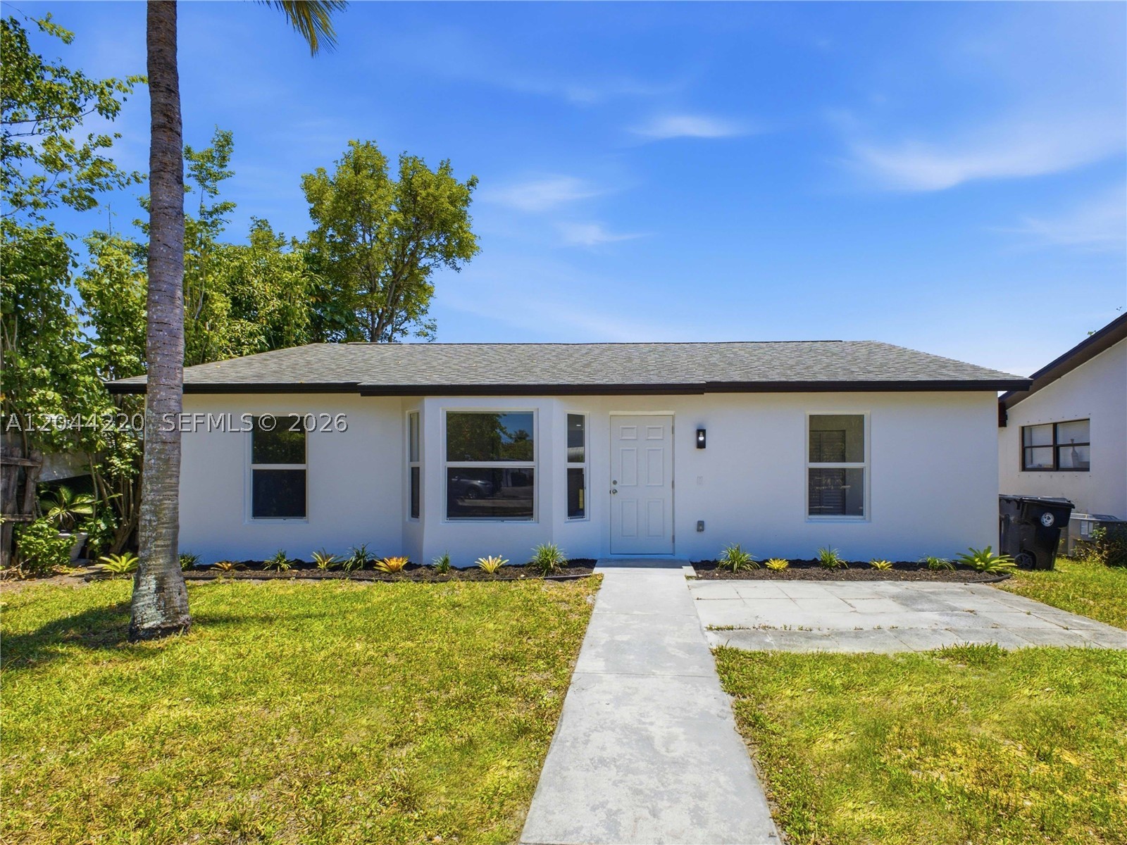 Seller is offering $10,000 toward buyer’s closing costs or interest rate buy-down! Fully upgraded home featuring a brand-new kitchen, updated bathrooms, new flooring throughout, and all-new appliances.Welcome to this charming 3-bedroom, 2-bath single-family home in the heart of Lake Worth Beach! Built in 1994 with durable CBS construction, this one-story residence offers 1,216 sq. ft. of comfortable living space on a spacious 8,769 sq. ft. lot. The functional floor plan features a bright living area, ceramic tile and carpet flooring, first-floor entry, and generously sized bedrooms. The kitchen comes equipped with a dishwasher, microwave, refrigerator, washer, and dryer, making it move-in ready. Central air conditioning and heating provide year-round comfort. Major updates include an 8-year-old roof, a 2-month-old A/C system, and a 6-year-old water heater. The oversized yard offers endless possibilities for outdoor living, entertaining, gardening, or future expansion. With no HOA and no rental restrictions, this property is ideal for homeowners, first-time buyers, or investors. Conveniently located near schools, parks, shopping, dining, major highways, downtown Lake Worth Beach, and just minutes from the beach. Eligible for Conventional, FHA, VA, and Cash financing. Don't miss this fantastic opportunity to own a well-maintained home with great potential in a desirable Palm Beach County location. Schedule your private showing today!
