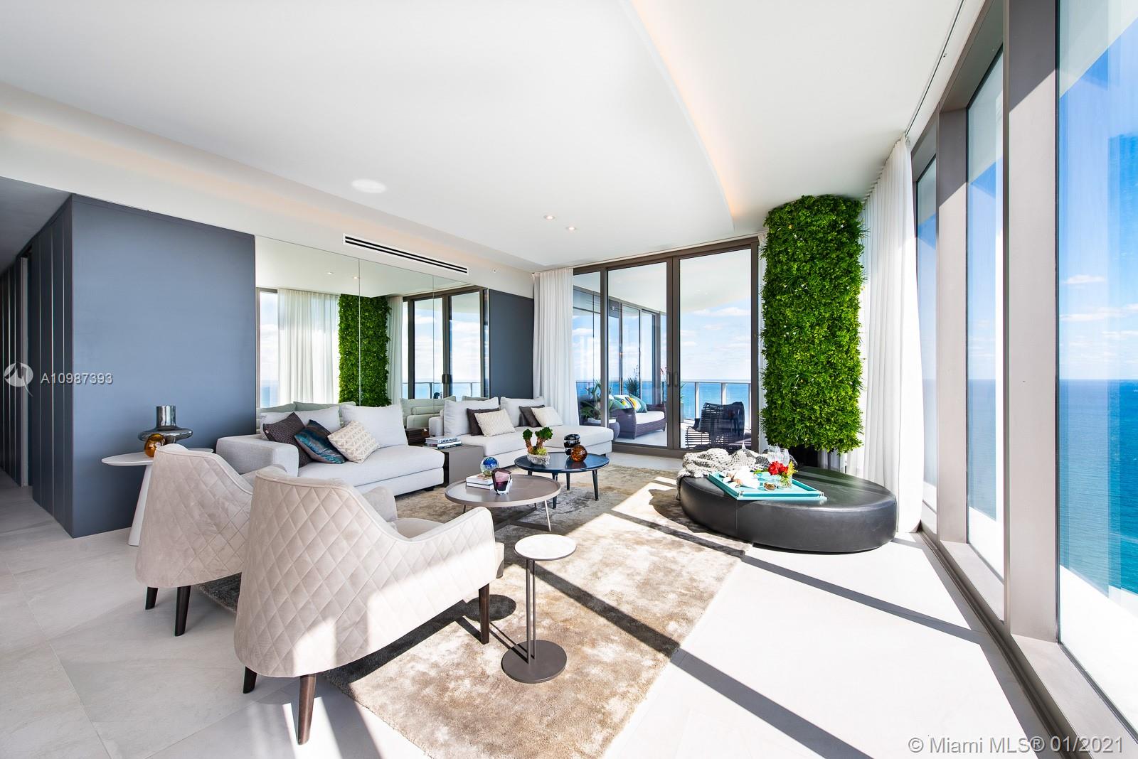 Unique super high-floor 4 bedrooms/5.5 baths with 10' ceilings wrapping around the entire South side,  sweeping 180 degrees of phenomenal ocean, intercoastal and bay views from the 43rd floor, maximized by its floor-to-ceiling windows. Turn-key and ready to move in, this unit features four balconies, Gaggenau appliances, Snaidero kitchen, Ornare panels and closets, 48x48 Italian porcelain throughout and designer furniture. Sitting on 250 ft. of oceanfront property The Ritz-Carlton Residences Sunny Isles Beach was designed by world-class architectural firm Arquitectonica and interiors by Michelle Bonan. Building amenities include 2 pools, fitness center, spinning room, pilates room, spa, beauty center, restaurant, pool and beach service, concierge, guest suites and more! A must see!