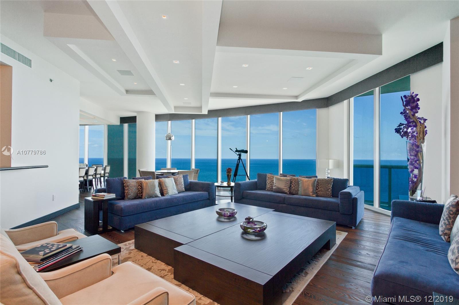 Breathtaking oceanfront Sky Residence, South-East Corner unit. 5086 Sq.ft under A/C, 920 sq.ft private terraces.
5bd, 6.5 bths, plus library TV room living, dining area & gourmet kitchen. Settled on 270 feet of pristine white
sand. Enjoy panoramic views of the Atlantic, Intracoastal and city skyline from 11'' floor-to-ceiling impact proof
windows and wrap-around terraces. This Home is professionally decorated, the custom kitchen offers designer
appliances, including temperature-controlled wine storage and a Miele espresso machine. Perfect for entertaining,
this residence features an elegant dining room with spacious family room, all with ocean or Intracoastal views.