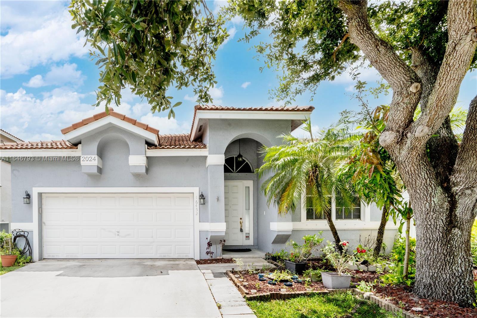 Absolutely stunning 3-bedroom, 2-bathroom, single-story home with a 2-car garage, located in the heart of Pembroke Pines. This bright and spacious home features an open split floor plan that radiates a warm and welcoming atmosphere.  A large screened-in patio offers beautiful water views, perfect for sunset watching and entertaining. The oversized, fenced-in backyard provides ample space for a pool. Conveniently located near A-rated schools, colleges, hospitals, major attractions, and easy access to I-75.