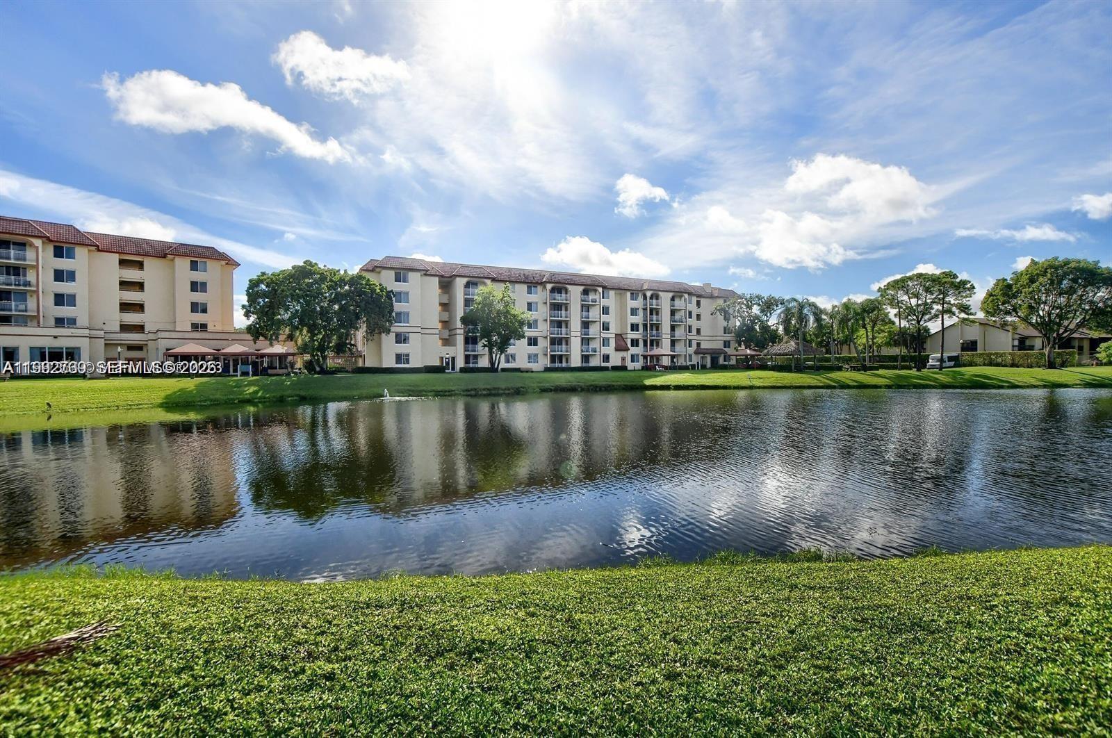 CONDO HAS RESERVES, ALL AGES WELCOME AND NO RENTAL RESTRICTIONS!!!  can be IMMEDIATELY RENTED, COMMERCIAL VEHICLES and PETS ALLOWED!! !  FIRST FLOOR UNIT, 2beds,2 baths unit conveniently located. Close to I-95 and Sawgrass Expressway  Recent upgrades include a New ROOF, FLOORING, REFRIGERATOR, DISWASHER. WASHER & DRYER ARE INSIDE THE UNIT. The community also features a NEW GYM. Remodeled master bathroom, spacious bedrooms and new ceramic floors throughout the kitchen and living areas. Don't miss out on this incredible opportunity! Owner is the Listing agent Easy showing quick closing association does not have credit score requirements. GATED  COMMUNITY with pool and grill  area, spa, sauna, walking trails, WATER INCLUDED excellent location, close to Hwy 95, Sawgrass Express, Hillsboro Beach 10 minutes, Shopping center ( Walmart, Banks, McDonald, medical office,) crossing the street, AMTRACK Train Station just only 8 minutes away to go to Orlando or Miami. EASY SHOWING, LA is the Owner. FIRST TIME HOME BUYERS OR INVESTORS ARE WELCOME - CONDO QUALIFY FOR FHA- CONVENTIONAL- VA LOANS -CONDO HAS RESERVES. The property is currently rented; the lease expires on July 20, 2026.