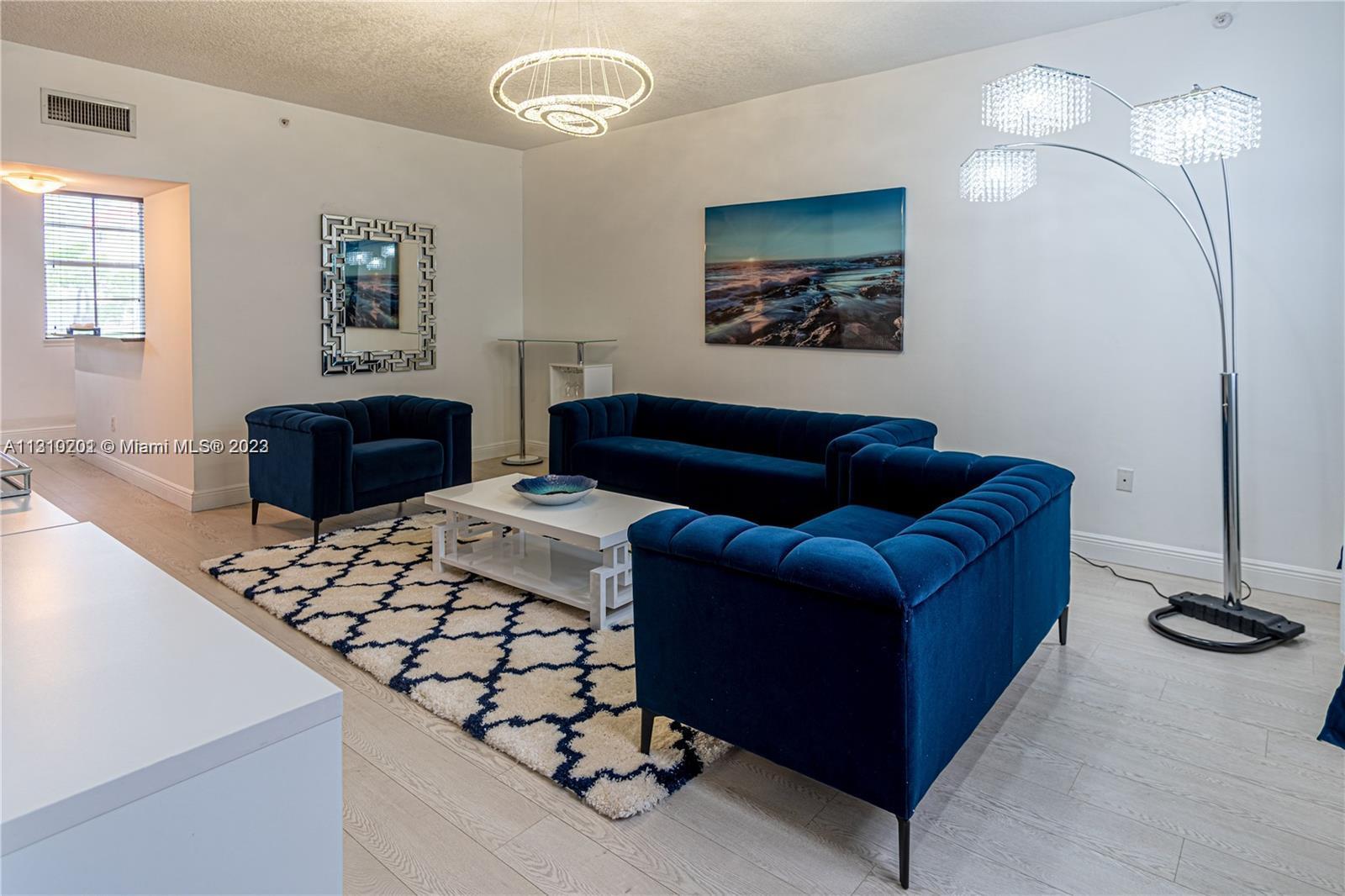 Looking for more space than a typical apartment can offer? Look no further than this turnkey tri-level townhouse with a private garage and plenty of room to spread out. With big flat-screen TVs in a gated community, this unit is truly one of a kind.  Located in the prestigious 2080 Townhomes on the Intracoastal waterway, you'll have access to all the amenities you could ever want, including beach chairs and umbrellas, a heated pool, a hot tub, a new gym with an ocean view, a new clubhouse, a sauna, a BBQ area, a tennis court, a business center, and more. And with an attached 2-car garage, you'll have plenty of space to park your vehicles and store your belongings.  Don't miss out on this incredible opportunity to live in luxury and style.