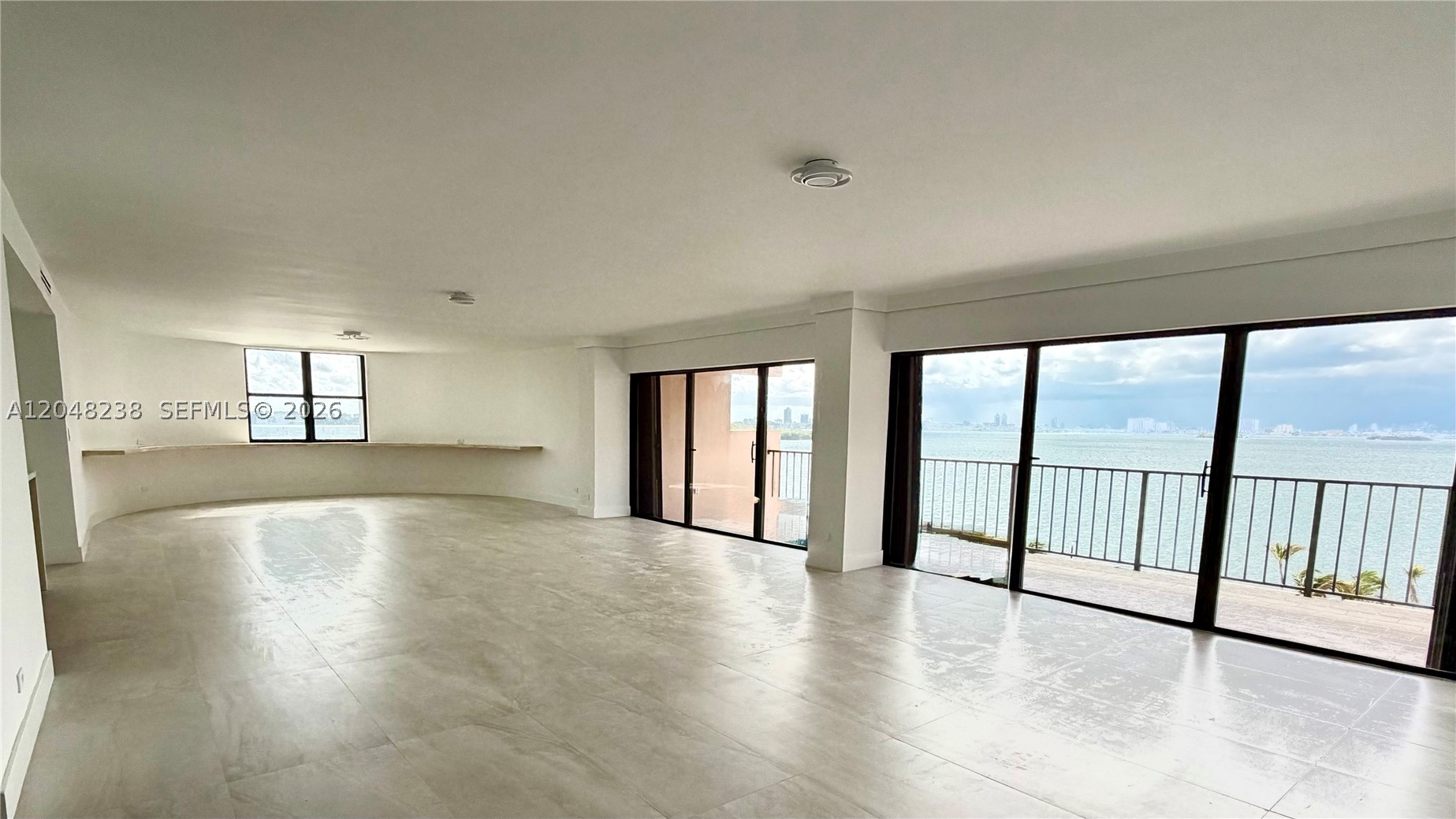 MUST-SEE WATERFRONT VALUE! In today’s Miami market, finding a spacious, fully renovated rotunda unit with sweeping Biscayne Bay views at this price is increasingly rare. This is an outstanding opportunity for buyers looking for exceptional space and real value. The unique ROTUNDA design at THE CRICKET CLUB CONDO creates an expansive, open feel with dramatic angles that enhance the spectacular views of the Intracoastal Waterway and Biscayne Bay. Enjoy two private balconies (east and south) offering panoramic vistas all the way to the Port of Miami, South Beach, Downtown Miami, and Brickell. This home features a complete high-end renovation, including a gourmet kitchen with ample pantry, double ovens, premium Samsung appliances, and modern in-unit laundry. The generous living spaces are ideal for both everyday comfort and entertaining. The Cricket Club is a full-service waterfront community with resort-style amenities: • Beautiful bayside pool • 3 tennis courts, pickleball & basketball courts • Walking track, kids’ playground & library • Well-equipped gym • 24-hour gated security Located in the desirable North Miami waterfront area, this unit delivers rare square footage, breathtaking water views, and luxury living — all at a price that represents excellent value compared to similar properties today. Don’t miss this smart buy. SCHEDULE your showing!