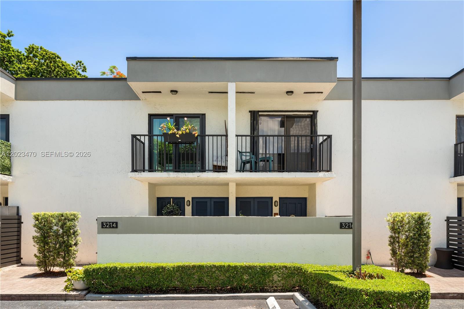 Beautifully updated 2-bed, 2.5-bath townhouse nestled in the heart of Coconut Grove. This move-in ready home features a modern open layout with impact windows throughout, updated kitchen with new appliances, new water heater, washer/dryer combo, and a freshly redone balcony. Both bedrooms offer spacious en-suite bathrooms and private balcony. Step outside to your own private backyard — perfect for relaxing or entertaining. Located in a gated community with guest parking and low HOA fees, just minutes from Coconut Grove's parks, boutique shops, and top dining. Easy access to US-1 and Downtown Grove. Ideal for end-users or investors.