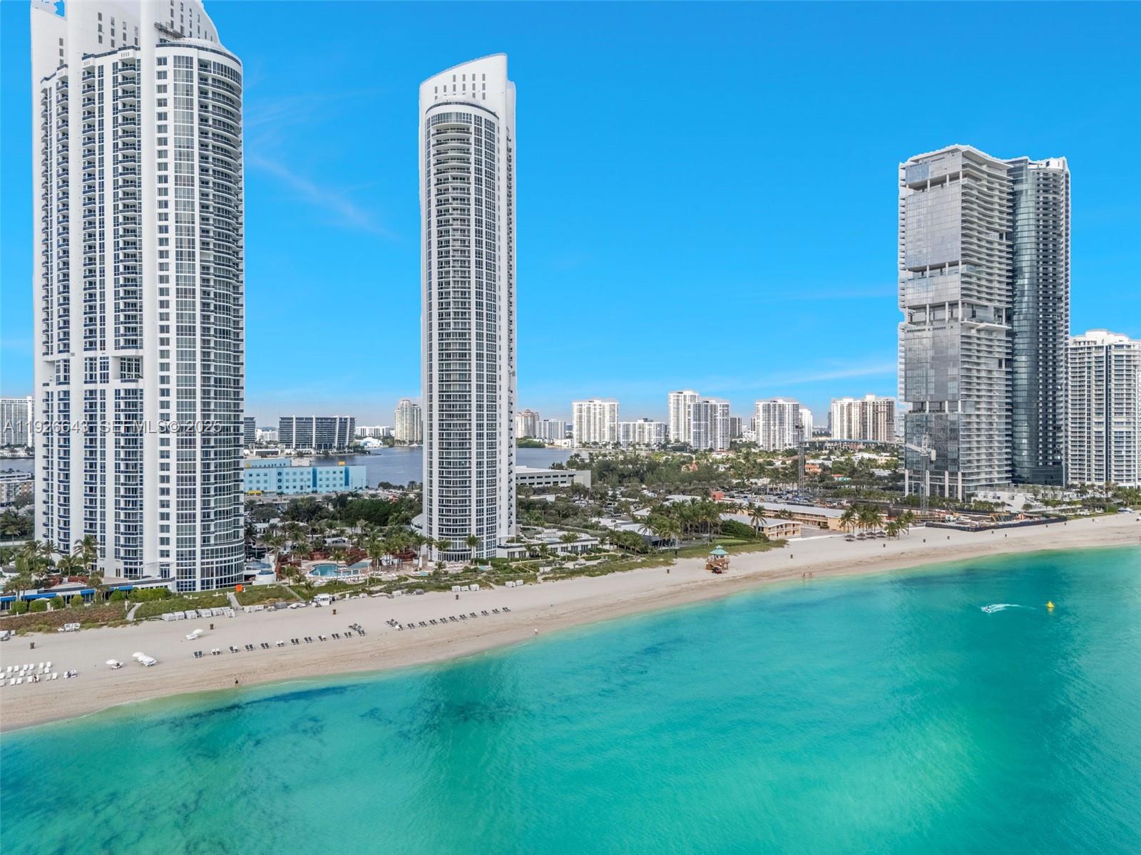SUNNY ISLES – THE FLORIDA RIVIERA | TRUMP ROYALE Luxurious 2-bedroom + den, 2-bath, 1577 SQ. FT. Residence with exquisite upgrades throughout. Elegant marble floors, fully redesigned bathrooms, a custom-built-in marble bar, smooth granite kitchen counters, recessed lighting, a marble-accented primary bath, and custom closets. Soaring 10 ft. ceilings and floor-to-ceiling glass showcase breathtaking Intracoastal, ocean, and Miami skyline views. Storage unit NOT INCLUDED (purchased separately). Resort-style living with a private Beach Club, multiple pools, beach and poolside food & beverage service, on-site restaurants, tennis courts, oceanview fitness center, fitness classes, and a full-service spa with sauna and steam. Walk to restaurants and nearby shops, Bal Harbor, and Aventura Mall. Best location in Sunny Isles! Preview By Appoitment only!