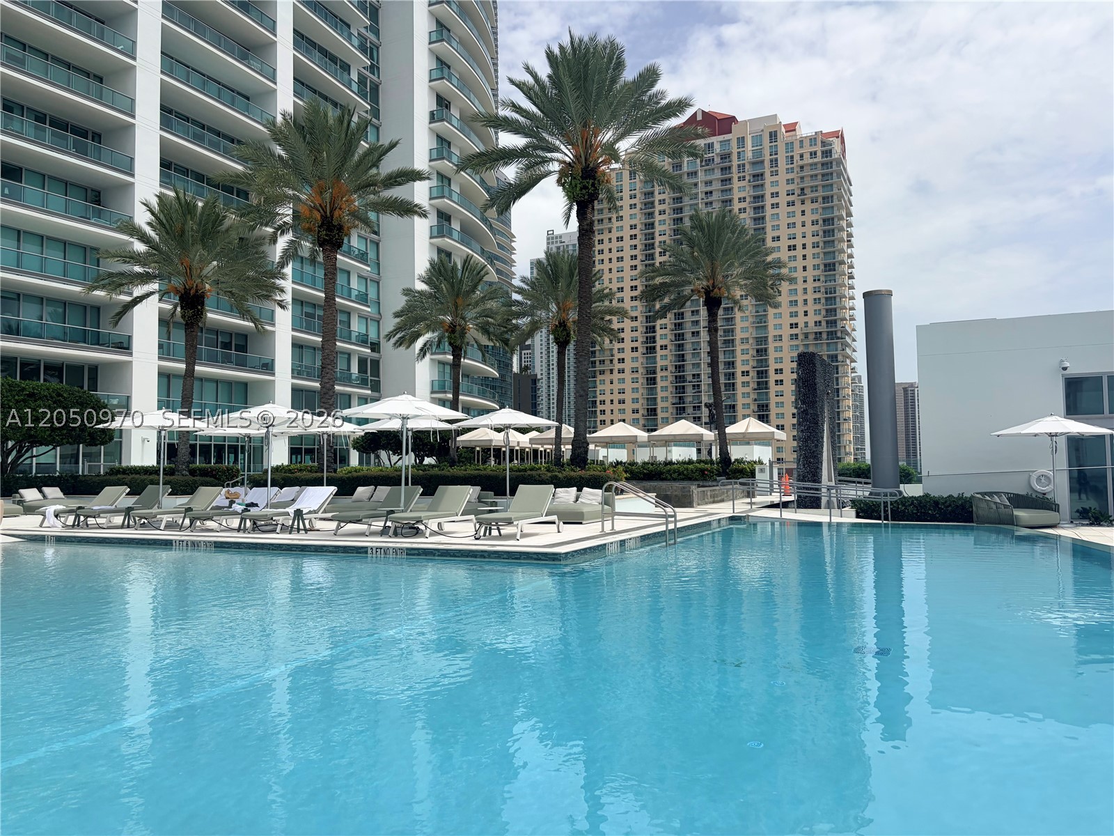 Stunning residence at The Jade in the heart of Brickell! This 2 Bed/2 Bath unit (den enclosed as 2nd bedroom) offers 1,293 SF of luxury living with marble floors throughout, granite countertops, and European appliances. The master suite features a spa-like en-suite bath with his-and-her sinks and a private jacuzzi tub. Unit includes one assigned parking spot, a climate-controlled storage unit, and internet & cable included. Enjoy resort-style amenities including a 24-hr attended lobby & concierge, guest valet, infinity-edge waterfront pool, European spa, state-of-the-art fitness center, business center, Resident Club Room, and assigned parking. Steps to Mary Brickell Village, Brickell City Centre, and Miami's best dining & nightlife — minutes to the airport, South Beach, and Coconut Grove. Don't miss this rare opportunity in one of Brickell's premier waterfront towers!
