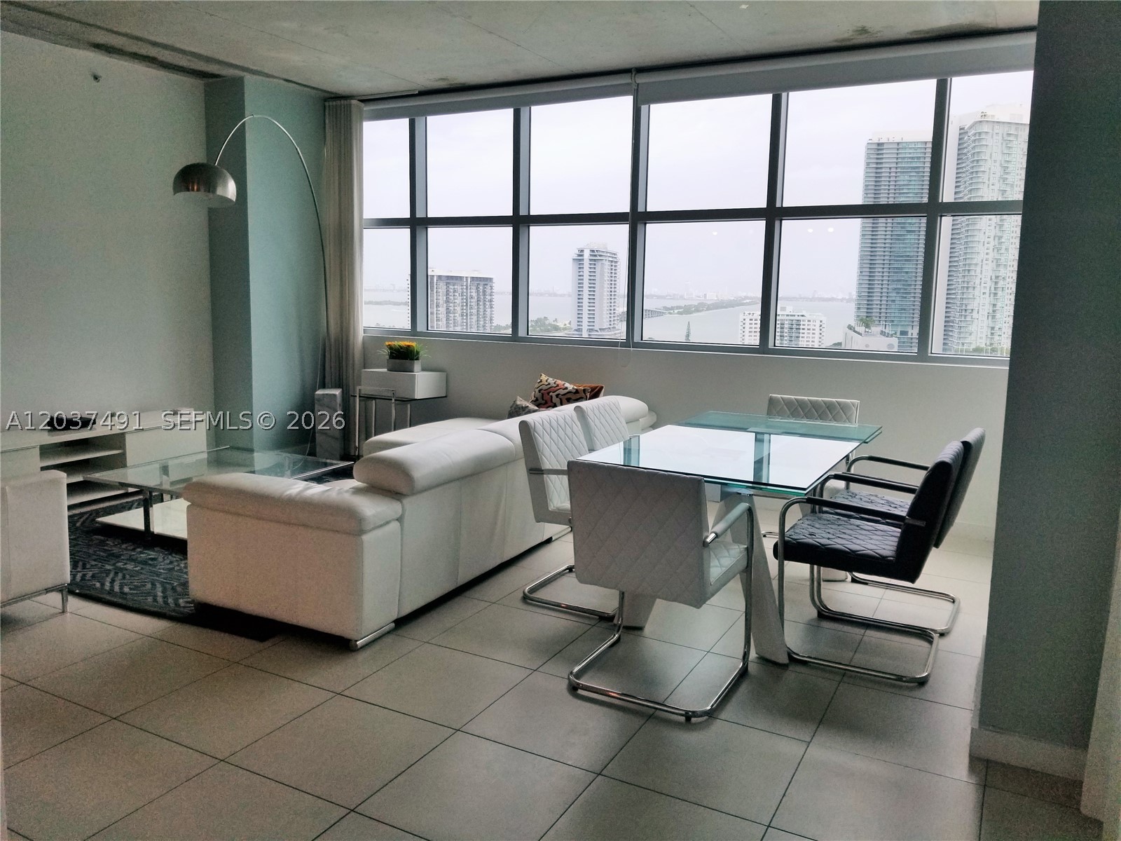 Fully furnished apartment with 2 bedrooms and 2 baths in Midtown's most alluring location! Split floor plan with open kitchen, washer & dryer, covered parking. Walking distance to restaurants and shops. Amenities include pool, fitness center & much more! Owner will require background check and credit report through tenant screening now Easy to show - Lockbox