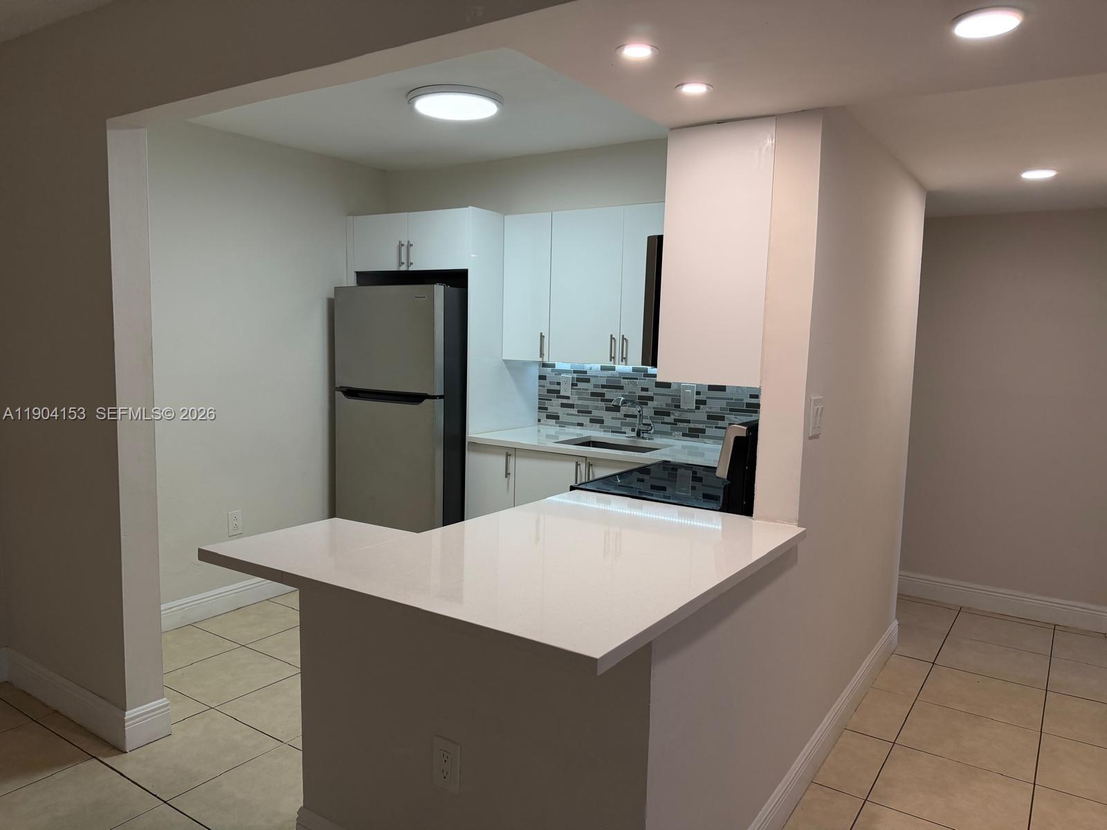 DORAL GARDENS II CONDO - Residential Lease