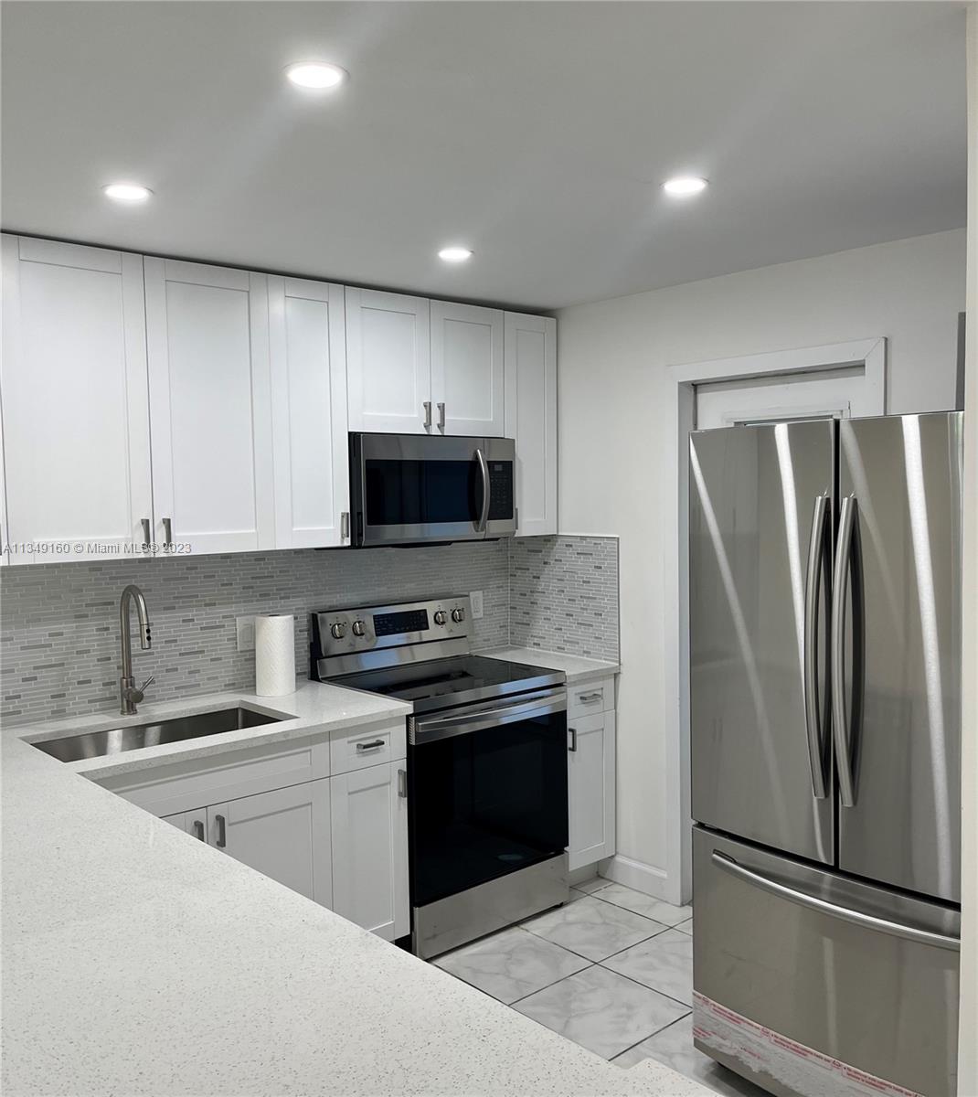 55+ Location location location! Completely remodeled, kitchen bathroom paint marble flooring new AC system. Across the street from Diplomat mall, restaurants, and shopping centers (PUBLIX, WIN DIXIE). 15-minute walk to the beach. Excellent schools in the area. safe neighborhood.
After renovation. New appliances. New Impact windows installed. New walls, electric, etc. New air conditioner. New water heater. New pipes.