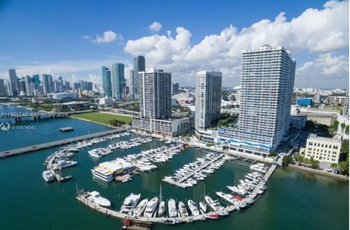 This unit was converted to large 2 Bed + Den and 2 Bath( Can be easily converted back to 3/3) . At 1,840 Sq Ft of interior, this unit offers breathtaking views of Biscayne Bay, the Ocean and Margaret Pace Park. Located at The Grand, the building is in a prime location, only minutes away from Brickell, Miami Beach, Design District, and Miami International Airport, making it an ideal spot for both leisure and travel. The building amenities include pool, jacuzzi, fitness center, and access to the Retail Shops located at the lobby level featuring over 5 restaurants, a beauty salon, pharmacy, mini-market and more.