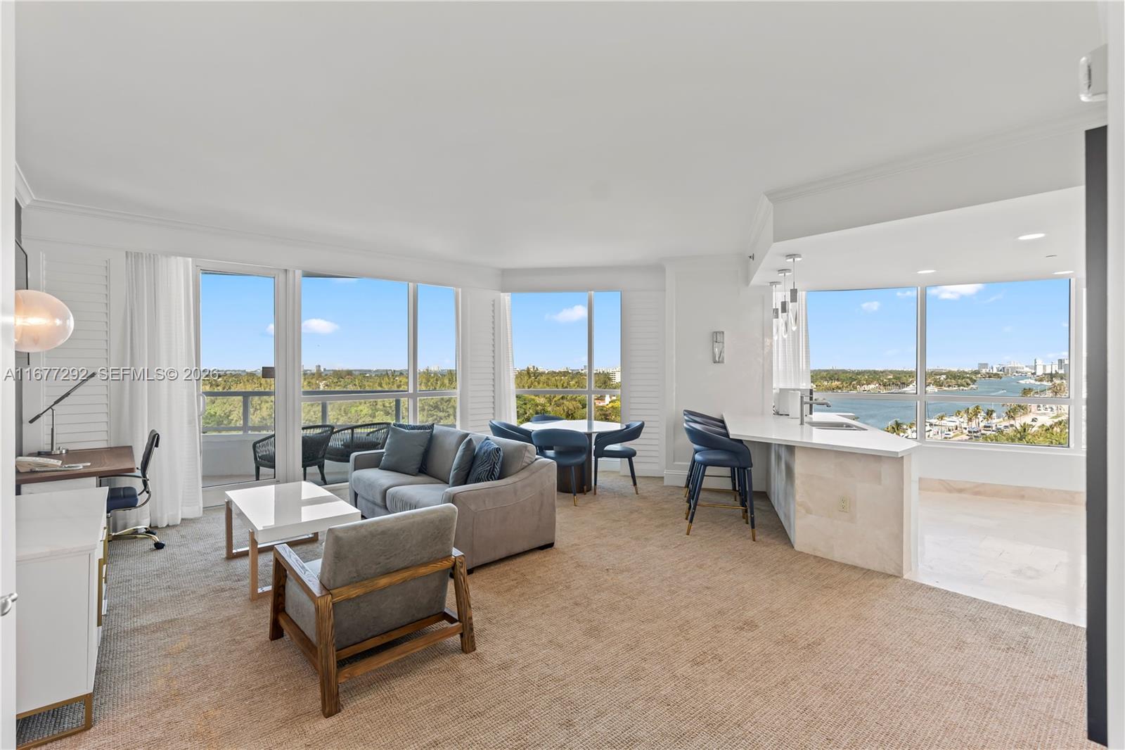 Enjoy full service, vacation-style living in this furnished turnkey corner unit at the Fontainebleau II Tresor with beautiful unobstructed water views. Offering floor to ceiling glass windows, 2 private balconies, spacious living room with sleeper sofa, open kitchen layout, king bed in primary bedroom with walk in closet, washer/dryer & more. Option to enroll in hotel rental program & receive income while away! The Fontainebleau resort offers award-winning restaurants, LIV night club, Lapis spa & state-of-the-art fitness center, bakery, shops, full-service salon and more. Maintenance fees include all utilities: AC, internet, cable, local calls, electricity, valet + daily free breakfast in owner's lounge. Please click the virtual tour link to see a video of the property.