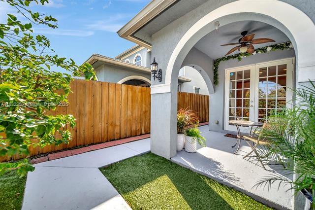 Brillant and immaculate 3/2/1, newly painted,  large backyard Meticulously maintained,
this 3BR/2.5BA (2440 sq ft) town home with a 1 car garage showcases a number of notable features including
impact windows, porcelain tile flooring on the main level, an open kitchen with granite counter tops, stainless steel
appliances, and french doors leading to a patio. The second level has a large bedrooms and a master
suite with sitting area and large walk in closet. The master bathroom has dual sinks, a walk in
shower. The very private outdoor space includes a fully fenced backyard with a Florida room and a outdoor Jacuzzi